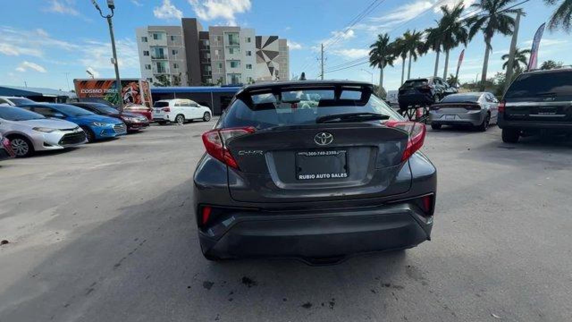 2019 Gray Toyota C-HR (NMTKHMBX9KR) with an 4 2.0 L engine, Variable transmission, located at 27610 S Dixie Hwy, Homestead, FL, 33032, (305) 749-2348, 25.510241, -80.438301 - KBB.com Brand Image Awards. Delivers 31 Highway MPG and 27 City MPG! This Toyota C-HR boasts a Regular Unleaded I-4 2.0 L/121 engine powering this Variable transmission. Wing Spoiler, VSC Electronic Stability Control (ESC), Variable Intermittent Wipers.* This Toyota C-HR Features the Following Optio - Photo#3