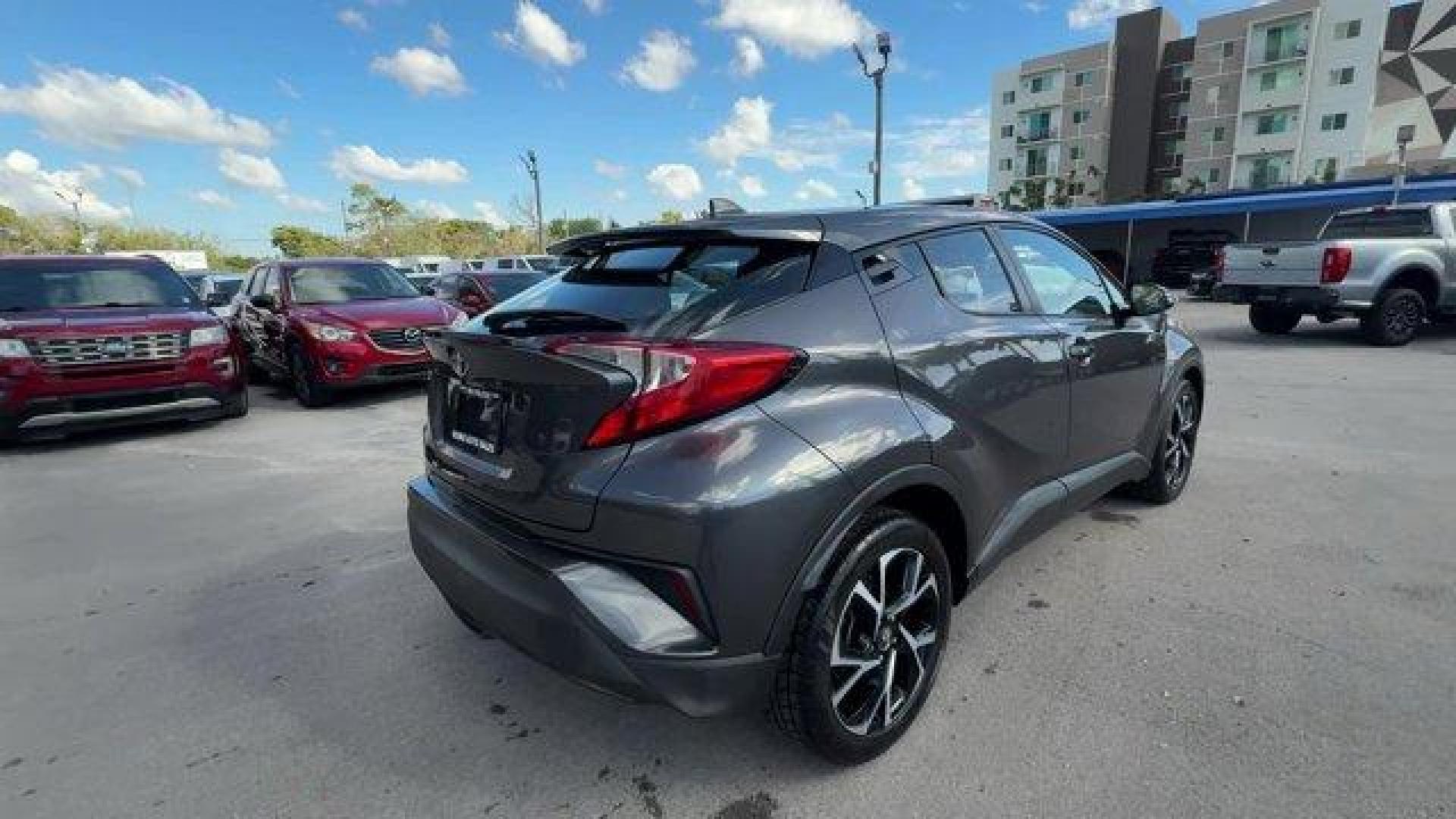 2019 Gray Toyota C-HR (NMTKHMBX9KR) with an 4 2.0 L engine, Variable transmission, located at 27610 S Dixie Hwy, Homestead, FL, 33032, (305) 749-2348, 25.510241, -80.438301 - KBB.com Brand Image Awards. Delivers 31 Highway MPG and 27 City MPG! This Toyota C-HR boasts a Regular Unleaded I-4 2.0 L/121 engine powering this Variable transmission. Wing Spoiler, VSC Electronic Stability Control (ESC), Variable Intermittent Wipers.* This Toyota C-HR Features the Following Optio - Photo#4