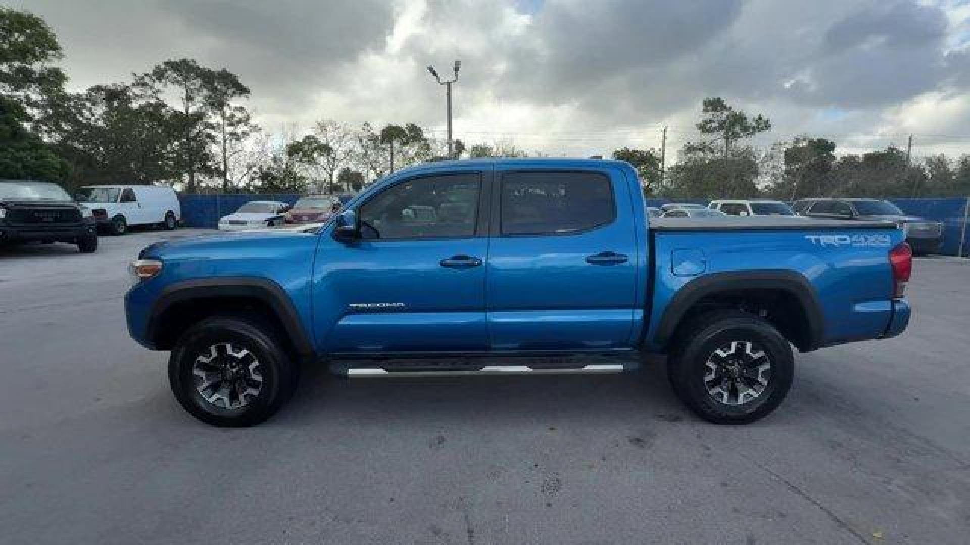2016 Blue Toyota Tacoma (5TFCZ5AN7GX) with an 6 3.5 L engine, Automatic transmission, located at 27610 S Dixie Hwy, Homestead, FL, 33032, (305) 749-2348, 25.510241, -80.438301 - KBB.com Best Buy Awards Finalist. Scores 23 Highway MPG and 18 City MPG! This Toyota Tacoma delivers a Regular Unleaded V-6 3.5 L/211 engine powering this Automatic transmission. Transmission: 6-Speed Automatic -inc: electronic shift and gated shifter, Tailgate/Rear Door Lock Included w/Power Door L - Photo#1