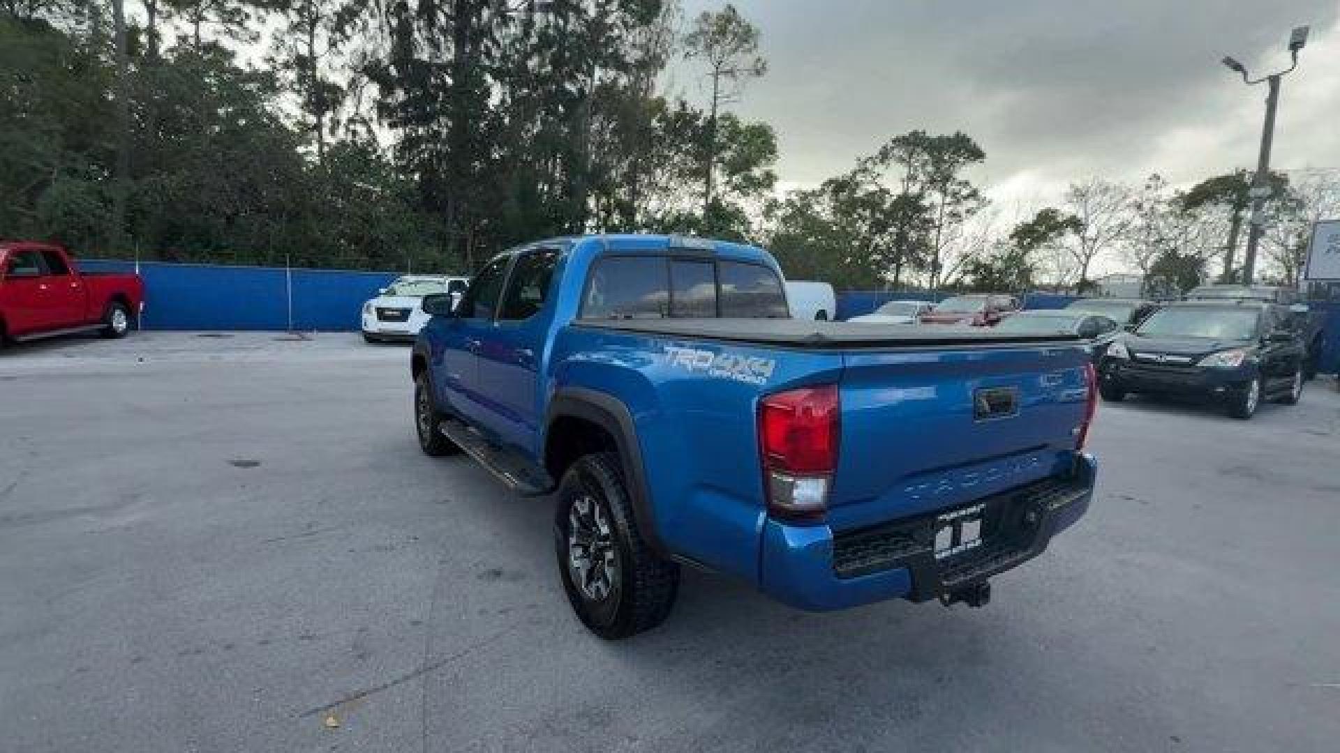 2016 Blue Toyota Tacoma (5TFCZ5AN7GX) with an 6 3.5 L engine, Automatic transmission, located at 27610 S Dixie Hwy, Homestead, FL, 33032, (305) 749-2348, 25.510241, -80.438301 - KBB.com Best Buy Awards Finalist. Scores 23 Highway MPG and 18 City MPG! This Toyota Tacoma delivers a Regular Unleaded V-6 3.5 L/211 engine powering this Automatic transmission. Transmission: 6-Speed Automatic -inc: electronic shift and gated shifter, Tailgate/Rear Door Lock Included w/Power Door L - Photo#2