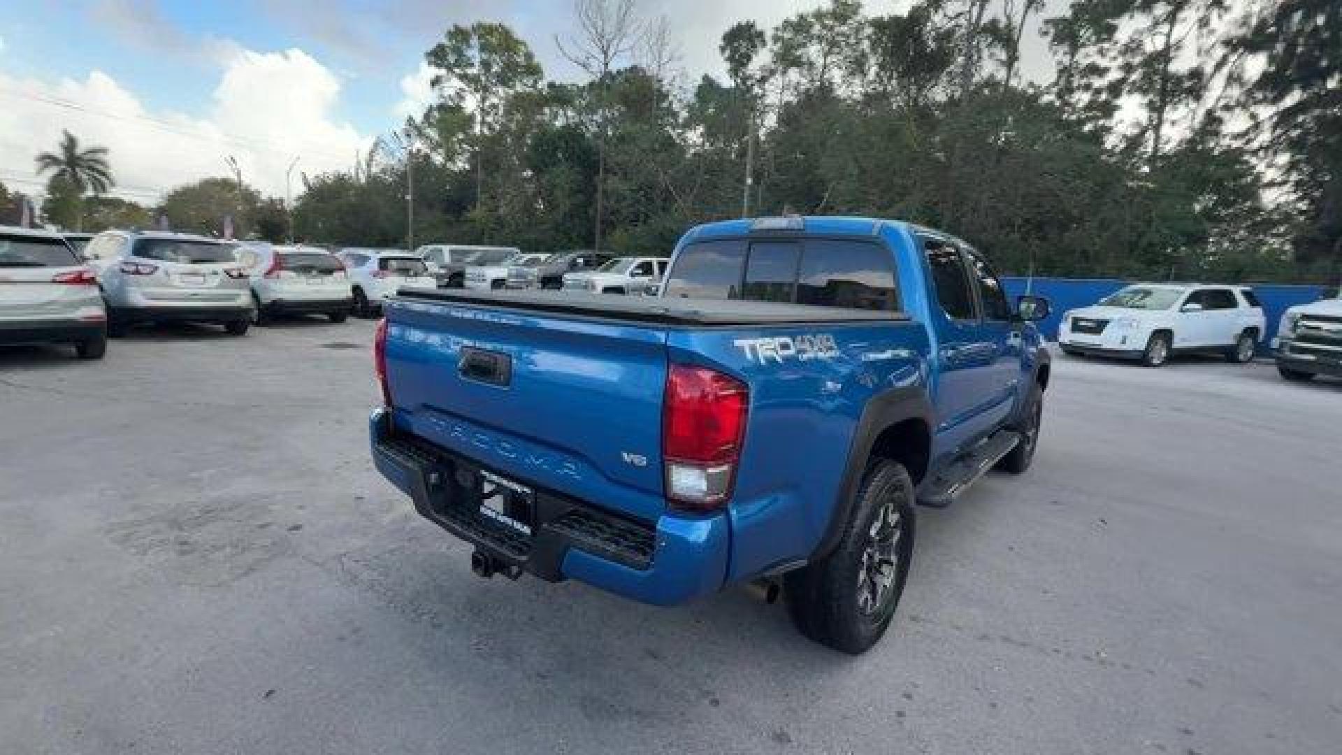 2016 Blue Toyota Tacoma (5TFCZ5AN7GX) with an 6 3.5 L engine, Automatic transmission, located at 27610 S Dixie Hwy, Homestead, FL, 33032, (305) 749-2348, 25.510241, -80.438301 - KBB.com Best Buy Awards Finalist. Scores 23 Highway MPG and 18 City MPG! This Toyota Tacoma delivers a Regular Unleaded V-6 3.5 L/211 engine powering this Automatic transmission. Transmission: 6-Speed Automatic -inc: electronic shift and gated shifter, Tailgate/Rear Door Lock Included w/Power Door L - Photo#4