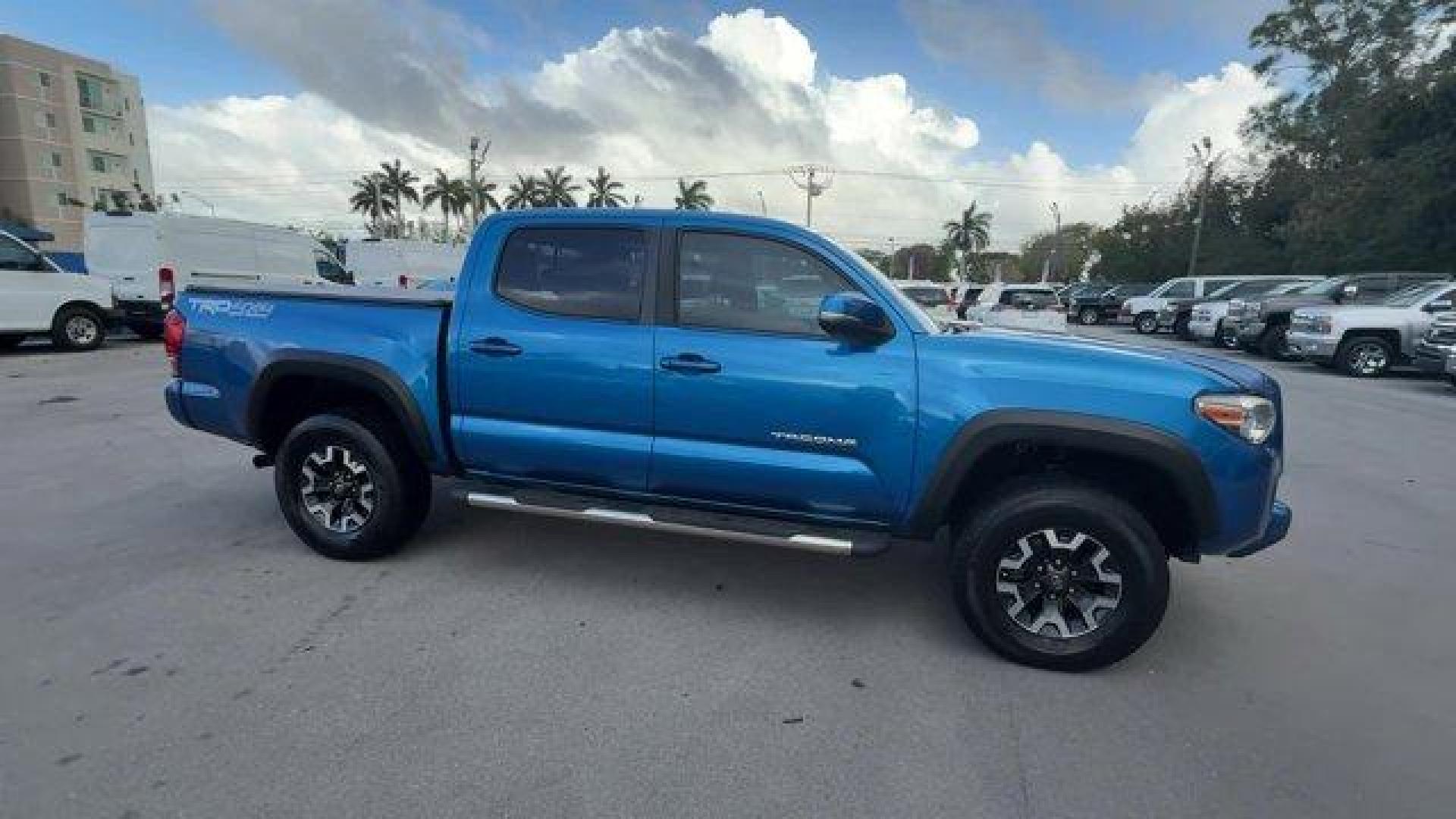 2016 Blue Toyota Tacoma (5TFCZ5AN7GX) with an 6 3.5 L engine, Automatic transmission, located at 27610 S Dixie Hwy, Homestead, FL, 33032, (305) 749-2348, 25.510241, -80.438301 - KBB.com Best Buy Awards Finalist. Scores 23 Highway MPG and 18 City MPG! This Toyota Tacoma delivers a Regular Unleaded V-6 3.5 L/211 engine powering this Automatic transmission. Transmission: 6-Speed Automatic -inc: electronic shift and gated shifter, Tailgate/Rear Door Lock Included w/Power Door L - Photo#5