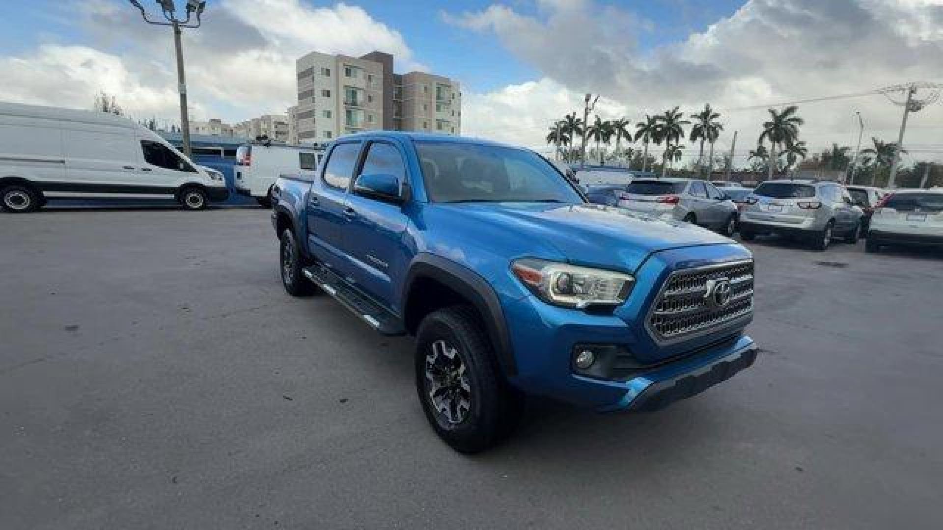 2016 Blue Toyota Tacoma (5TFCZ5AN7GX) with an 6 3.5 L engine, Automatic transmission, located at 27610 S Dixie Hwy, Homestead, FL, 33032, (305) 749-2348, 25.510241, -80.438301 - KBB.com Best Buy Awards Finalist. Scores 23 Highway MPG and 18 City MPG! This Toyota Tacoma delivers a Regular Unleaded V-6 3.5 L/211 engine powering this Automatic transmission. Transmission: 6-Speed Automatic -inc: electronic shift and gated shifter, Tailgate/Rear Door Lock Included w/Power Door L - Photo#6