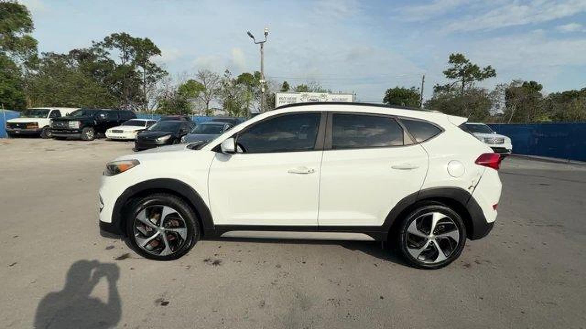 2017 Dazzling White /Gray Hyundai Tucson (KM8J33A28HU) with an 4 1.6 L engine, Automatic transmission, located at 27610 S Dixie Hwy, Homestead, FL, 33032, (305) 749-2348, 25.510241, -80.438301 - IIHS Top Safety Pick. Delivers 32 Highway MPG and 26 City MPG! This Hyundai Tucson delivers a Intercooled Turbo Regular Unleaded I-4 1.6 L/97 engine powering this Automatic transmission. OPTION GROUP 01, GRAY, YES ESSENTIALS CLOTH SEAT TRIM -inc: odor resistant cloth, FIRST AID KIT.*This Hyundai Tuc - Photo#1