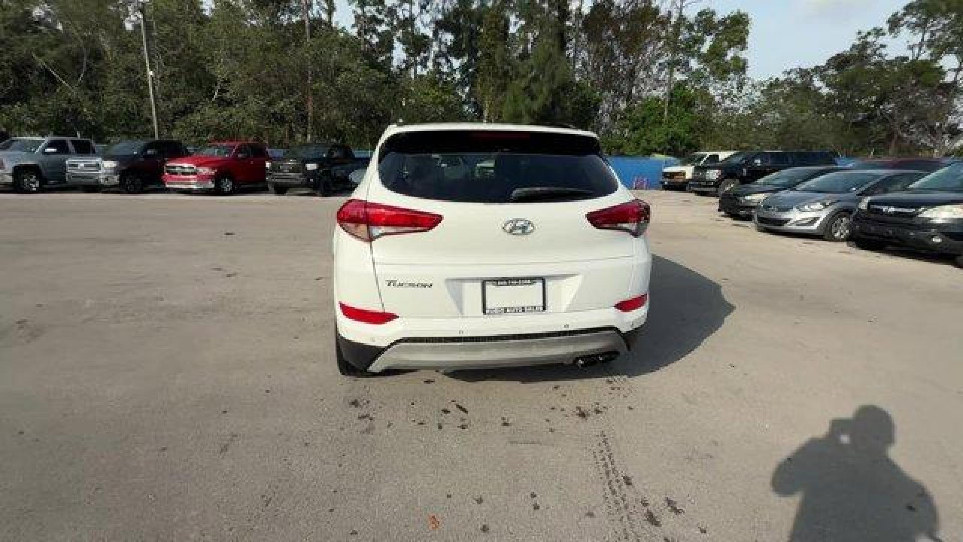 2017 Dazzling White /Gray Hyundai Tucson (KM8J33A28HU) with an 4 1.6 L engine, Automatic transmission, located at 27610 S Dixie Hwy, Homestead, FL, 33032, (305) 749-2348, 25.510241, -80.438301 - IIHS Top Safety Pick. Delivers 32 Highway MPG and 26 City MPG! This Hyundai Tucson delivers a Intercooled Turbo Regular Unleaded I-4 1.6 L/97 engine powering this Automatic transmission. OPTION GROUP 01, GRAY, YES ESSENTIALS CLOTH SEAT TRIM -inc: odor resistant cloth, FIRST AID KIT.*This Hyundai Tuc - Photo#3