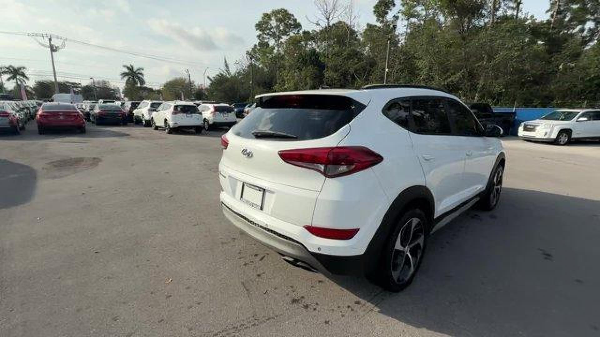 2017 Dazzling White /Gray Hyundai Tucson (KM8J33A28HU) with an 4 1.6 L engine, Automatic transmission, located at 27610 S Dixie Hwy, Homestead, FL, 33032, (305) 749-2348, 25.510241, -80.438301 - IIHS Top Safety Pick. Delivers 32 Highway MPG and 26 City MPG! This Hyundai Tucson delivers a Intercooled Turbo Regular Unleaded I-4 1.6 L/97 engine powering this Automatic transmission. OPTION GROUP 01, GRAY, YES ESSENTIALS CLOTH SEAT TRIM -inc: odor resistant cloth, FIRST AID KIT.*This Hyundai Tuc - Photo#4