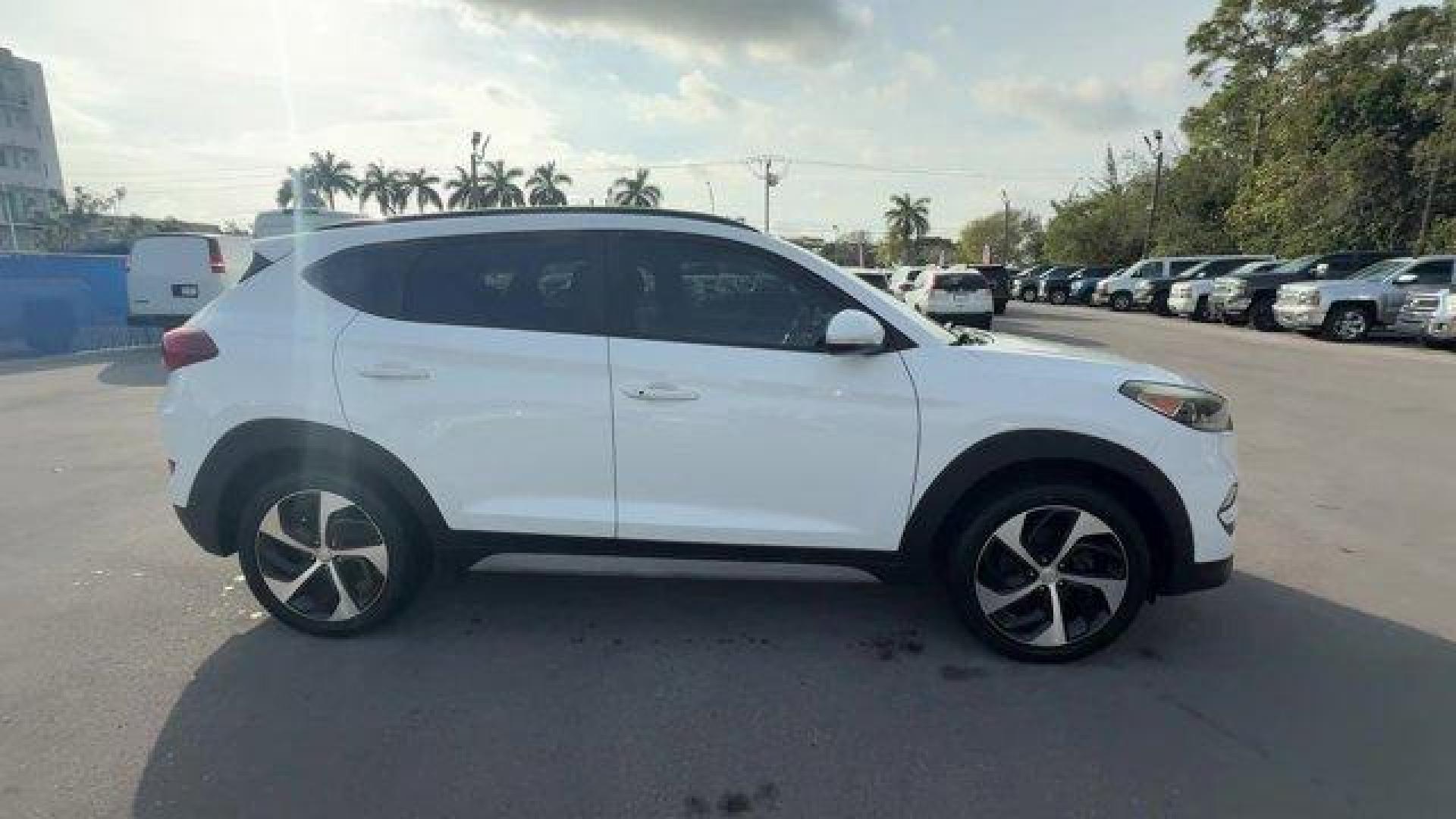 2017 Dazzling White /Gray Hyundai Tucson (KM8J33A28HU) with an 4 1.6 L engine, Automatic transmission, located at 27610 S Dixie Hwy, Homestead, FL, 33032, (305) 749-2348, 25.510241, -80.438301 - IIHS Top Safety Pick. Delivers 32 Highway MPG and 26 City MPG! This Hyundai Tucson delivers a Intercooled Turbo Regular Unleaded I-4 1.6 L/97 engine powering this Automatic transmission. OPTION GROUP 01, GRAY, YES ESSENTIALS CLOTH SEAT TRIM -inc: odor resistant cloth, FIRST AID KIT.*This Hyundai Tuc - Photo#5