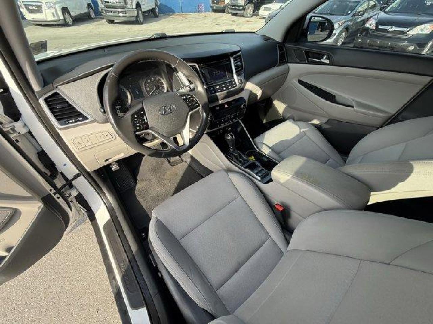 2017 Dazzling White /Gray Hyundai Tucson (KM8J33A28HU) with an 4 1.6 L engine, Automatic transmission, located at 27610 S Dixie Hwy, Homestead, FL, 33032, (305) 749-2348, 25.510241, -80.438301 - IIHS Top Safety Pick. Delivers 32 Highway MPG and 26 City MPG! This Hyundai Tucson delivers a Intercooled Turbo Regular Unleaded I-4 1.6 L/97 engine powering this Automatic transmission. OPTION GROUP 01, GRAY, YES ESSENTIALS CLOTH SEAT TRIM -inc: odor resistant cloth, FIRST AID KIT.*This Hyundai Tuc - Photo#10