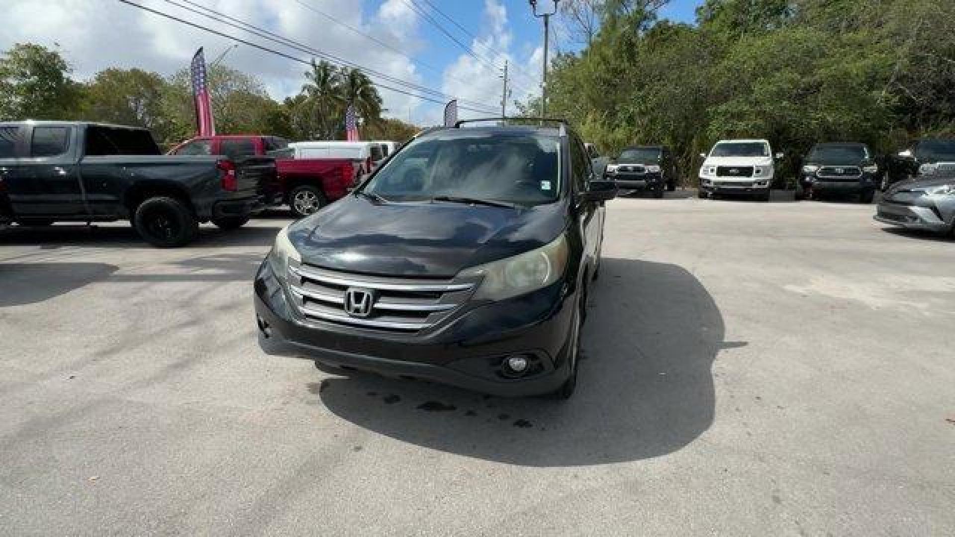 2012 Black Honda CR-V (5J6RM3H75CL) with an 4 2.4L engine, Automatic transmission, located at 27610 S Dixie Hwy, Homestead, FL, 33032, (305) 749-2348, 25.510241, -80.438301 - KBB.com Brand Image Awards. Only 104,724 Miles! Delivers 31 Highway MPG and 23 City MPG! This Honda CR-V boasts a Gas I4 2.4L/144 engine powering this Automatic transmission. XM satellite radio, Vehicle Stability Assist (VSA) w/traction control, Variable intermittent windshield wipers.*This Honda CR - Photo#0