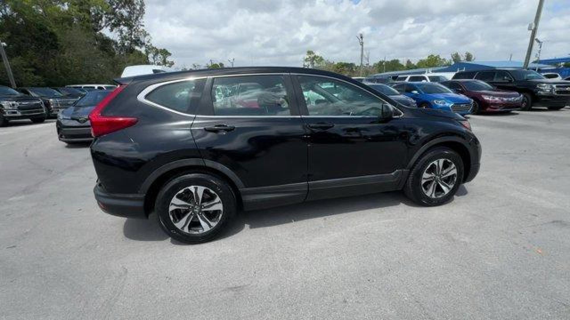 2017 Black Honda CR-V (5J6RW5H3XHL) with an 4 2.4 L engine, Variable transmission, located at 27610 S Dixie Hwy, Homestead, FL, 33032, (305) 749-2348, 25.510241, -80.438301 - KBB.com 10 Most Awarded Brands. Scores 32 Highway MPG and 26 City MPG! This Honda CR-V delivers a Regular Unleaded I-4 2.4 L/144 engine powering this Variable transmission. Wheels: 17 Alloy, Valet Function, Urethane Gear Shifter Material.* This Honda CR-V Features the Following Options *Trip Compute - Photo#5