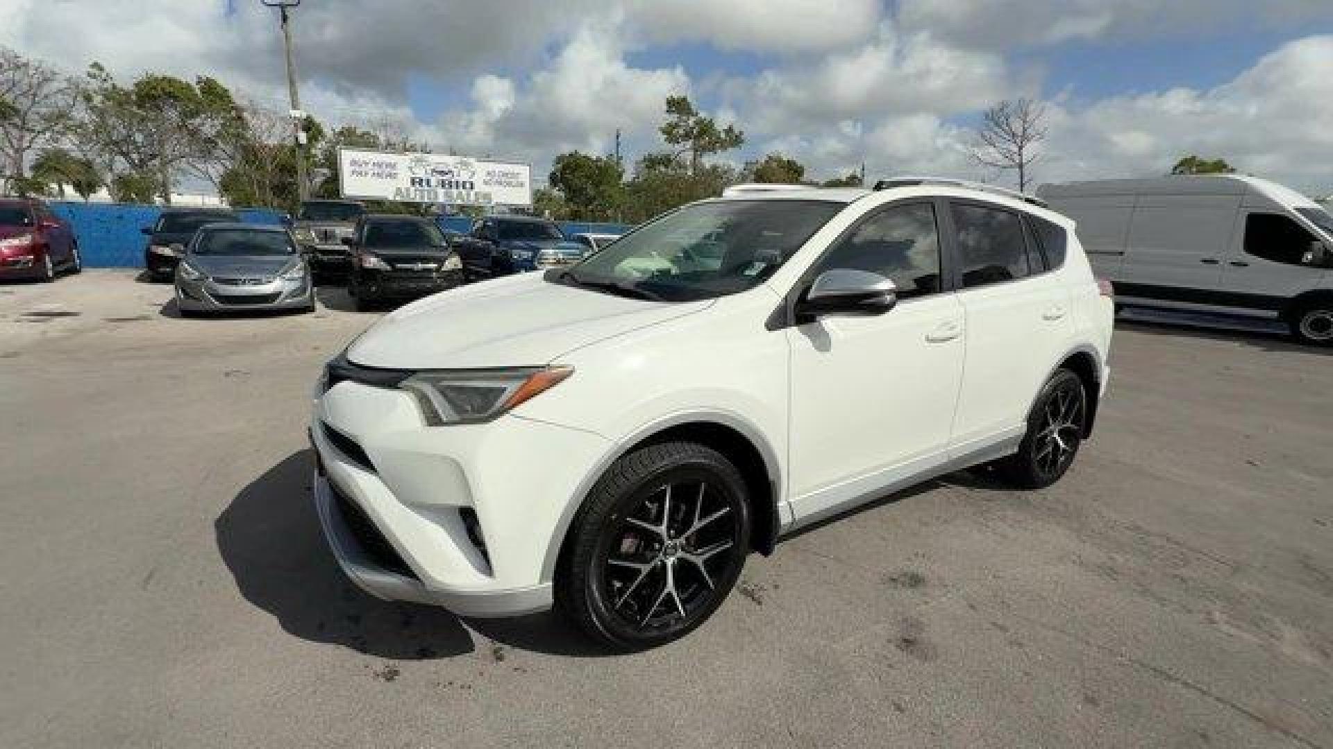 2016 White Toyota RAV4 (JTMJFREV6GD) with an 4 2.5 L engine, Automatic transmission, located at 27610 S Dixie Hwy, Homestead, FL, 33032, (305) 749-2348, 25.510241, -80.438301 - IIHS Top Safety Pick+. Delivers 29 Highway MPG and 22 City MPG! This Toyota RAV4 delivers a Regular Unleaded I-4 2.5 L/152 engine powering this Automatic transmission. Wheels: 18 Alloy Sport -inc: caps, Variable Intermittent Wipers, Valet Function.*This Toyota RAV4 Comes Equipped with These Options - Photo#0