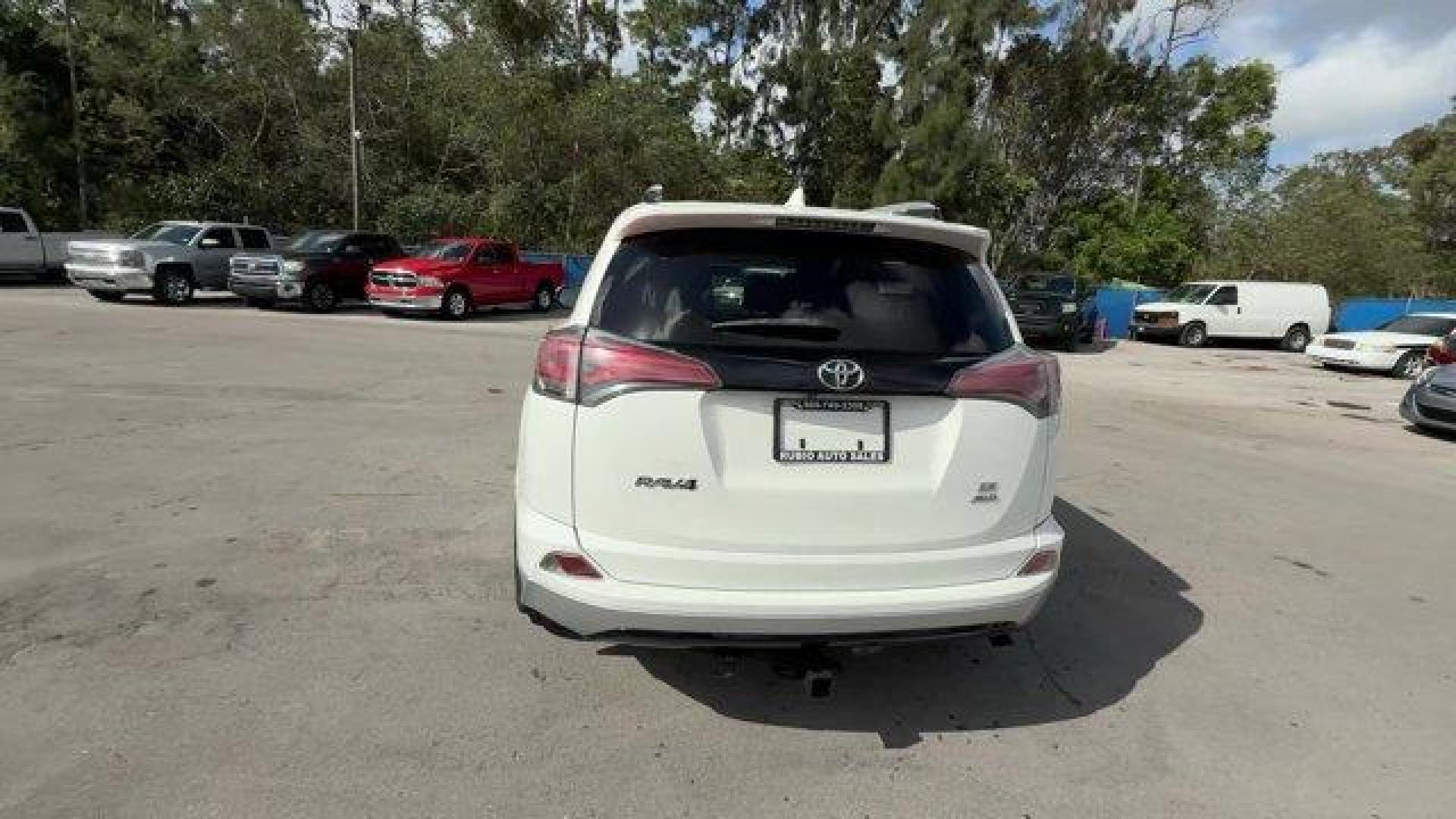 2016 White Toyota RAV4 (JTMJFREV6GD) with an 4 2.5 L engine, Automatic transmission, located at 27610 S Dixie Hwy, Homestead, FL, 33032, (305) 749-2348, 25.510241, -80.438301 - IIHS Top Safety Pick+. Delivers 29 Highway MPG and 22 City MPG! This Toyota RAV4 delivers a Regular Unleaded I-4 2.5 L/152 engine powering this Automatic transmission. Wheels: 18 Alloy Sport -inc: caps, Variable Intermittent Wipers, Valet Function.*This Toyota RAV4 Comes Equipped with These Options - Photo#3