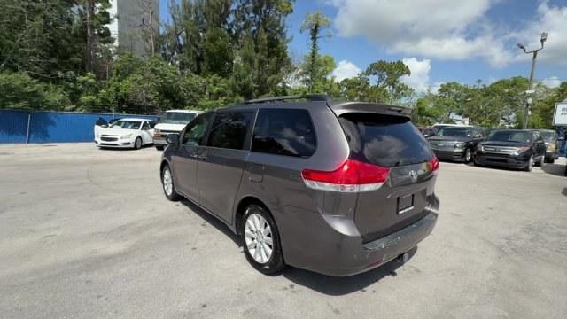2013 Gray Toyota Sienna (5TDDK3DC2DS) with an 6 3.5L engine, Automatic transmission, located at 27610 S Dixie Hwy, Homestead, FL, 33032, (305) 749-2348, 25.510241, -80.438301 - KBB.com Brand Image Awards. Delivers 23 Highway MPG and 16 City MPG! This Toyota Sienna boasts a Gas V6 3.5L/211 engine powering this Automatic transmission. Wood grain-style sliding center console -inc: illuminated storage, illuminated front cup holders, Washer-linked variable intermittent wipers -- Photo#2