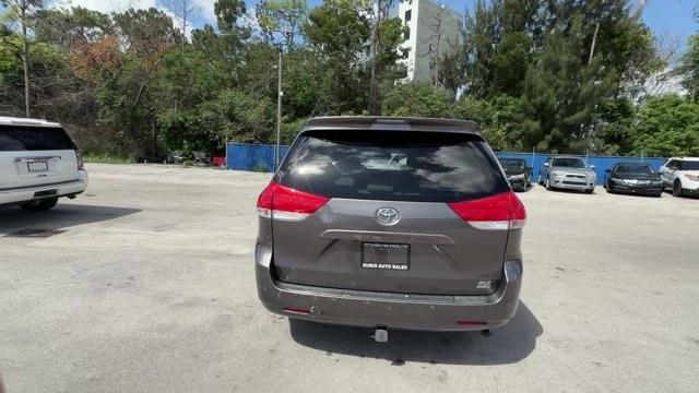 2013 Gray Toyota Sienna (5TDDK3DC2DS) with an 6 3.5L engine, Automatic transmission, located at 27610 S Dixie Hwy, Homestead, FL, 33032, (305) 749-2348, 25.510241, -80.438301 - KBB.com Brand Image Awards. Delivers 23 Highway MPG and 16 City MPG! This Toyota Sienna boasts a Gas V6 3.5L/211 engine powering this Automatic transmission. Wood grain-style sliding center console -inc: illuminated storage, illuminated front cup holders, Washer-linked variable intermittent wipers -- Photo#3