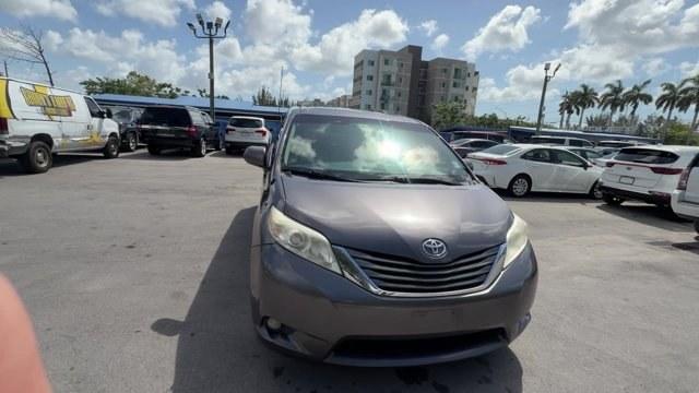 2013 Gray Toyota Sienna (5TDDK3DC2DS) with an 6 3.5L engine, Automatic transmission, located at 27610 S Dixie Hwy, Homestead, FL, 33032, (305) 749-2348, 25.510241, -80.438301 - KBB.com Brand Image Awards. Delivers 23 Highway MPG and 16 City MPG! This Toyota Sienna boasts a Gas V6 3.5L/211 engine powering this Automatic transmission. Wood grain-style sliding center console -inc: illuminated storage, illuminated front cup holders, Washer-linked variable intermittent wipers -- Photo#6