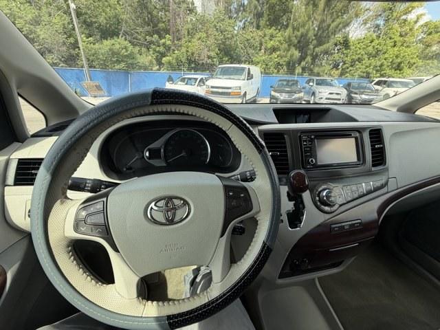 2013 Gray Toyota Sienna (5TDDK3DC2DS) with an 6 3.5L engine, Automatic transmission, located at 27610 S Dixie Hwy, Homestead, FL, 33032, (305) 749-2348, 25.510241, -80.438301 - KBB.com Brand Image Awards. Delivers 23 Highway MPG and 16 City MPG! This Toyota Sienna boasts a Gas V6 3.5L/211 engine powering this Automatic transmission. Wood grain-style sliding center console -inc: illuminated storage, illuminated front cup holders, Washer-linked variable intermittent wipers -- Photo#8