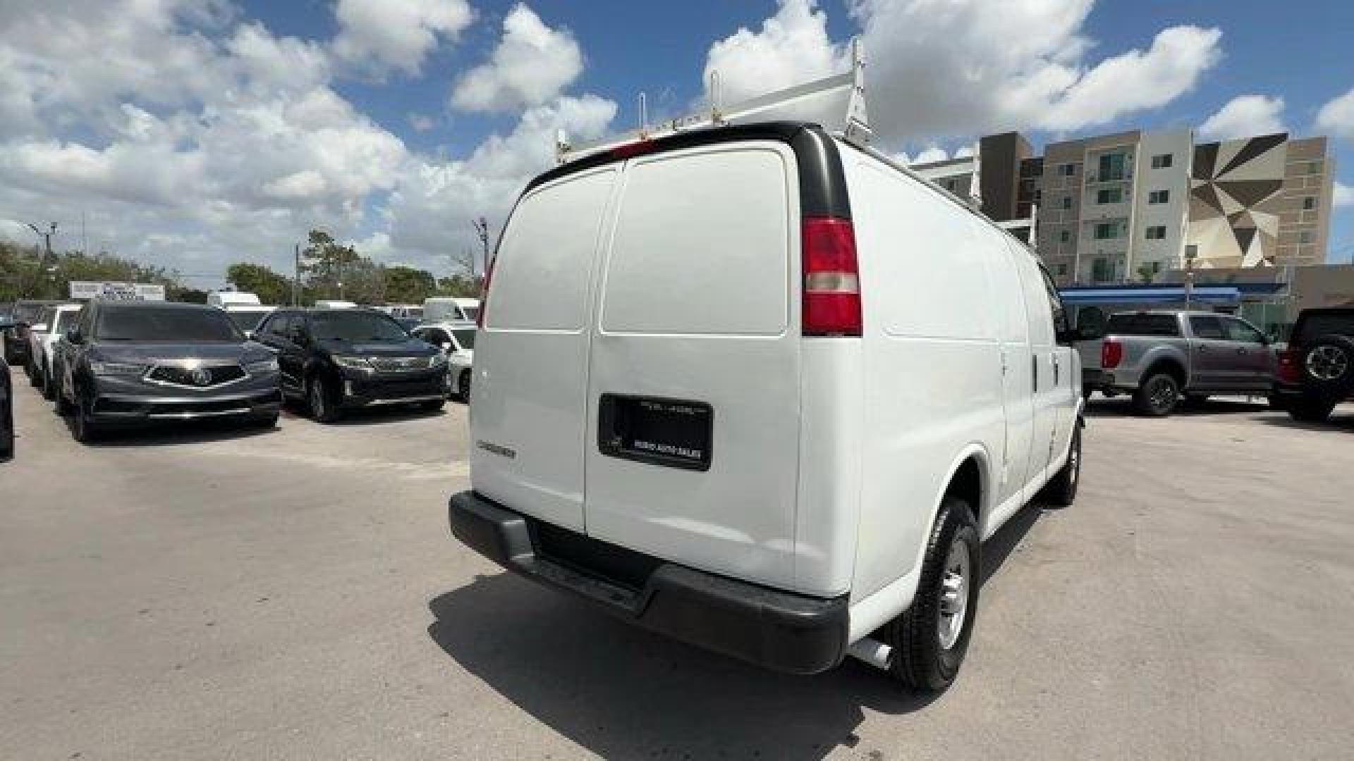 2017 Summit White /Medium Pewter Chevrolet Express Cargo Van (1GCWGAFF0H1) with an 8 4.8L engine, Automatic transmission, located at 27610 S Dixie Hwy, Homestead, FL, 33032, (305) 749-2348, 25.510241, -80.438301 - KBB.com 10 Most Awarded Brands. This Chevrolet Express Cargo Van delivers a Gas V8 4.8L/293 engine powering this Automatic transmission. VISORS, DRIVER AND FRONT PASSENGER vinyl in lieu of standard cloth, TRANSMISSION, 6-SPEED AUTOMATIC, HEAVY-DUTY, ELECTRONICALLY CONTROLLED with overdrive tow/haul - Photo#4