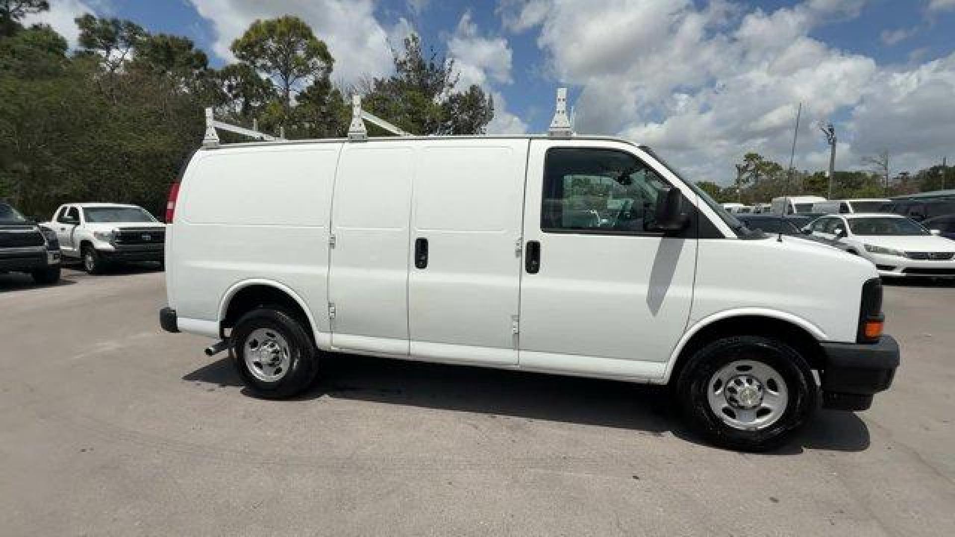 2017 Summit White /Medium Pewter Chevrolet Express Cargo Van (1GCWGAFF0H1) with an 8 4.8L engine, Automatic transmission, located at 27610 S Dixie Hwy, Homestead, FL, 33032, (305) 749-2348, 25.510241, -80.438301 - KBB.com 10 Most Awarded Brands. This Chevrolet Express Cargo Van delivers a Gas V8 4.8L/293 engine powering this Automatic transmission. VISORS, DRIVER AND FRONT PASSENGER vinyl in lieu of standard cloth, TRANSMISSION, 6-SPEED AUTOMATIC, HEAVY-DUTY, ELECTRONICALLY CONTROLLED with overdrive tow/haul - Photo#5
