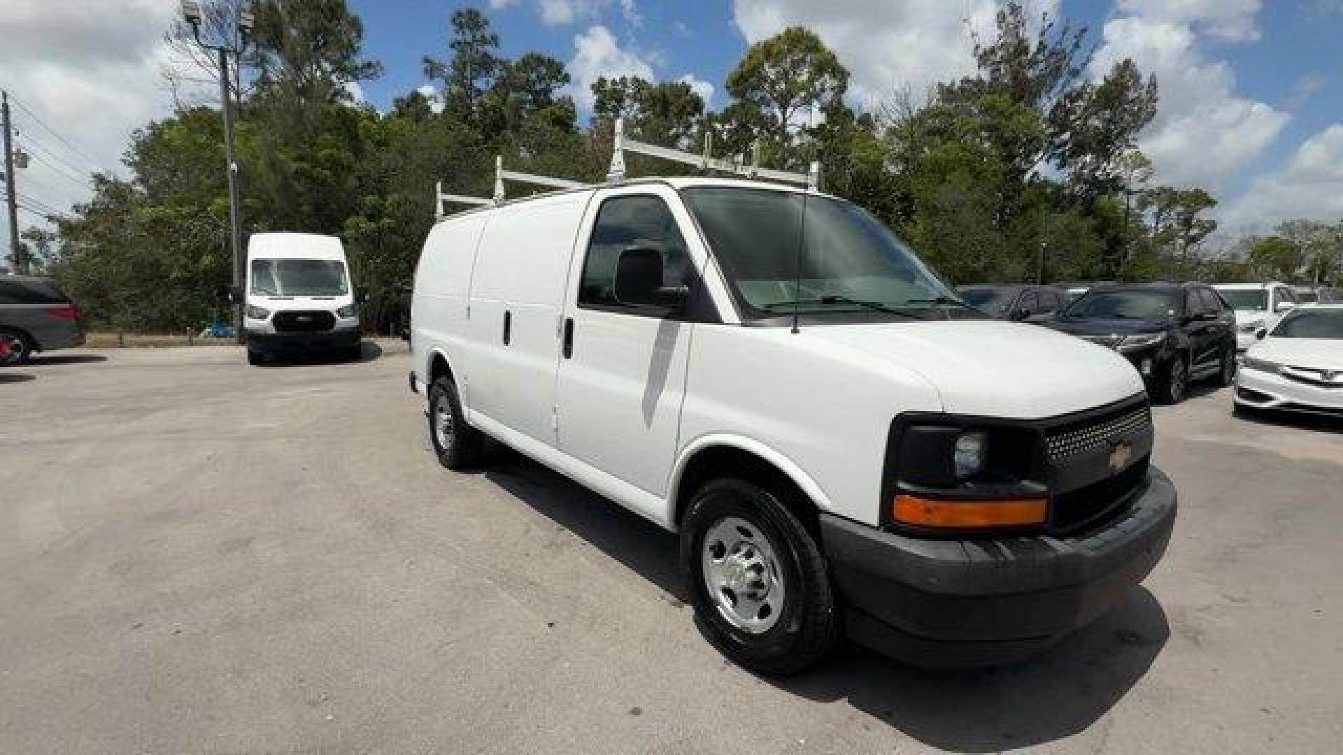 2017 Summit White /Medium Pewter Chevrolet Express Cargo Van (1GCWGAFF0H1) with an 8 4.8L engine, Automatic transmission, located at 27610 S Dixie Hwy, Homestead, FL, 33032, (305) 749-2348, 25.510241, -80.438301 - KBB.com 10 Most Awarded Brands. This Chevrolet Express Cargo Van delivers a Gas V8 4.8L/293 engine powering this Automatic transmission. VISORS, DRIVER AND FRONT PASSENGER vinyl in lieu of standard cloth, TRANSMISSION, 6-SPEED AUTOMATIC, HEAVY-DUTY, ELECTRONICALLY CONTROLLED with overdrive tow/haul - Photo#6