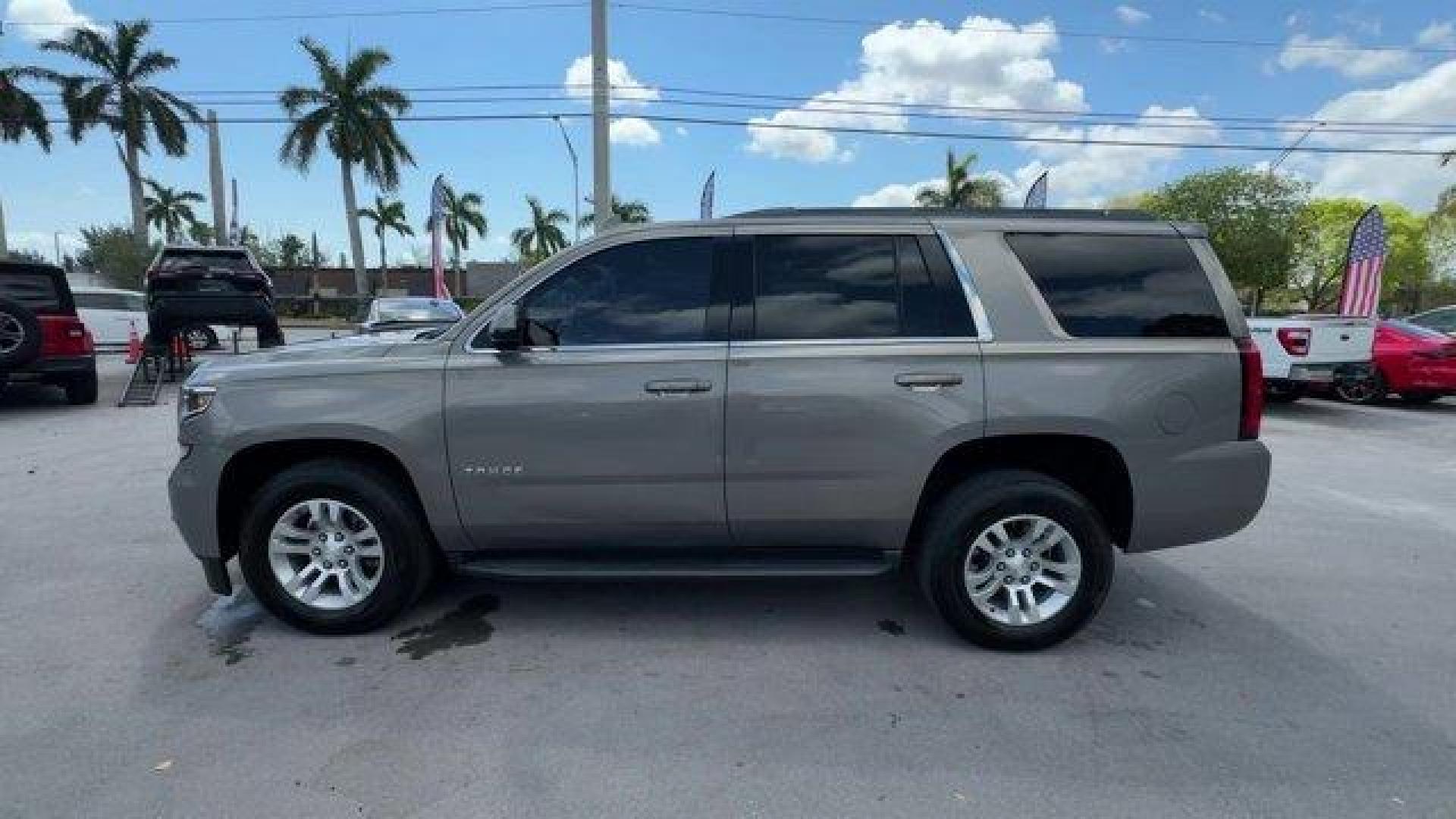 2018 Pepperdust Metallic /Jet Black Chevrolet Tahoe (1GNSCAKCXJR) with an 8 5.3L engine, Automatic transmission, located at 27610 S Dixie Hwy, Homestead, FL, 33032, (305) 749-2348, 25.510241, -80.438301 - KBB.com Best Family Cars. Scores 23 Highway MPG and 16 City MPG! This Chevrolet Tahoe boasts a Gas/Ethanol V8 5.3L/325 engine powering this Automatic transmission. WHEELS, 18 X 8.5 (45.7 CM X 21.6 CM) ALUMINUM WITH HIGH-POLISHED FINISH (STD), TRANSMISSION, 6-SPEED AUTOMATIC, ELECTRONICALLY CONTROLLE - Photo#1