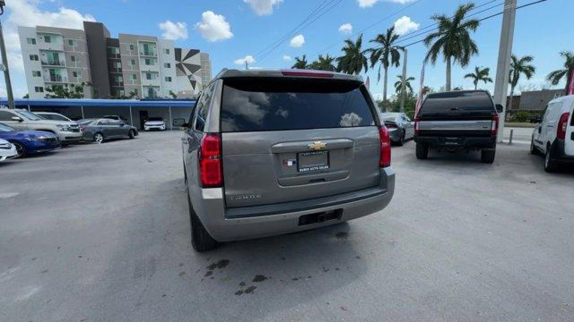 2018 Pepperdust Metallic /Jet Black Chevrolet Tahoe (1GNSCAKCXJR) with an 8 5.3L engine, Automatic transmission, located at 27610 S Dixie Hwy, Homestead, FL, 33032, (305) 749-2348, 25.510241, -80.438301 - KBB.com Best Family Cars. Scores 23 Highway MPG and 16 City MPG! This Chevrolet Tahoe boasts a Gas/Ethanol V8 5.3L/325 engine powering this Automatic transmission. WHEELS, 18 X 8.5 (45.7 CM X 21.6 CM) ALUMINUM WITH HIGH-POLISHED FINISH (STD), TRANSMISSION, 6-SPEED AUTOMATIC, ELECTRONICALLY CONTROLLE - Photo#3
