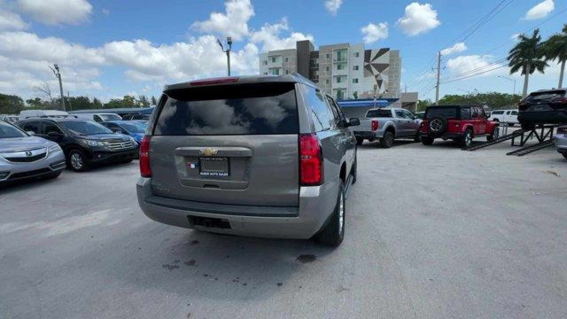2018 Pepperdust Metallic /Jet Black Chevrolet Tahoe (1GNSCAKCXJR) with an 8 5.3L engine, Automatic transmission, located at 27610 S Dixie Hwy, Homestead, FL, 33032, (305) 749-2348, 25.510241, -80.438301 - KBB.com Best Family Cars. Scores 23 Highway MPG and 16 City MPG! This Chevrolet Tahoe boasts a Gas/Ethanol V8 5.3L/325 engine powering this Automatic transmission. WHEELS, 18 X 8.5 (45.7 CM X 21.6 CM) ALUMINUM WITH HIGH-POLISHED FINISH (STD), TRANSMISSION, 6-SPEED AUTOMATIC, ELECTRONICALLY CONTROLLE - Photo#4