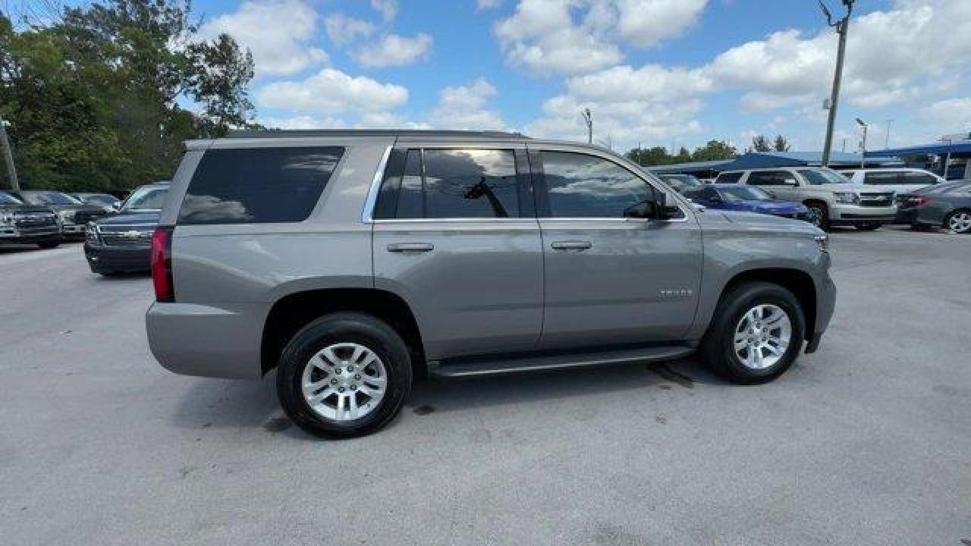 2018 Pepperdust Metallic /Jet Black Chevrolet Tahoe (1GNSCAKCXJR) with an 8 5.3L engine, Automatic transmission, located at 27610 S Dixie Hwy, Homestead, FL, 33032, (305) 749-2348, 25.510241, -80.438301 - KBB.com Best Family Cars. Scores 23 Highway MPG and 16 City MPG! This Chevrolet Tahoe boasts a Gas/Ethanol V8 5.3L/325 engine powering this Automatic transmission. WHEELS, 18 X 8.5 (45.7 CM X 21.6 CM) ALUMINUM WITH HIGH-POLISHED FINISH (STD), TRANSMISSION, 6-SPEED AUTOMATIC, ELECTRONICALLY CONTROLLE - Photo#5
