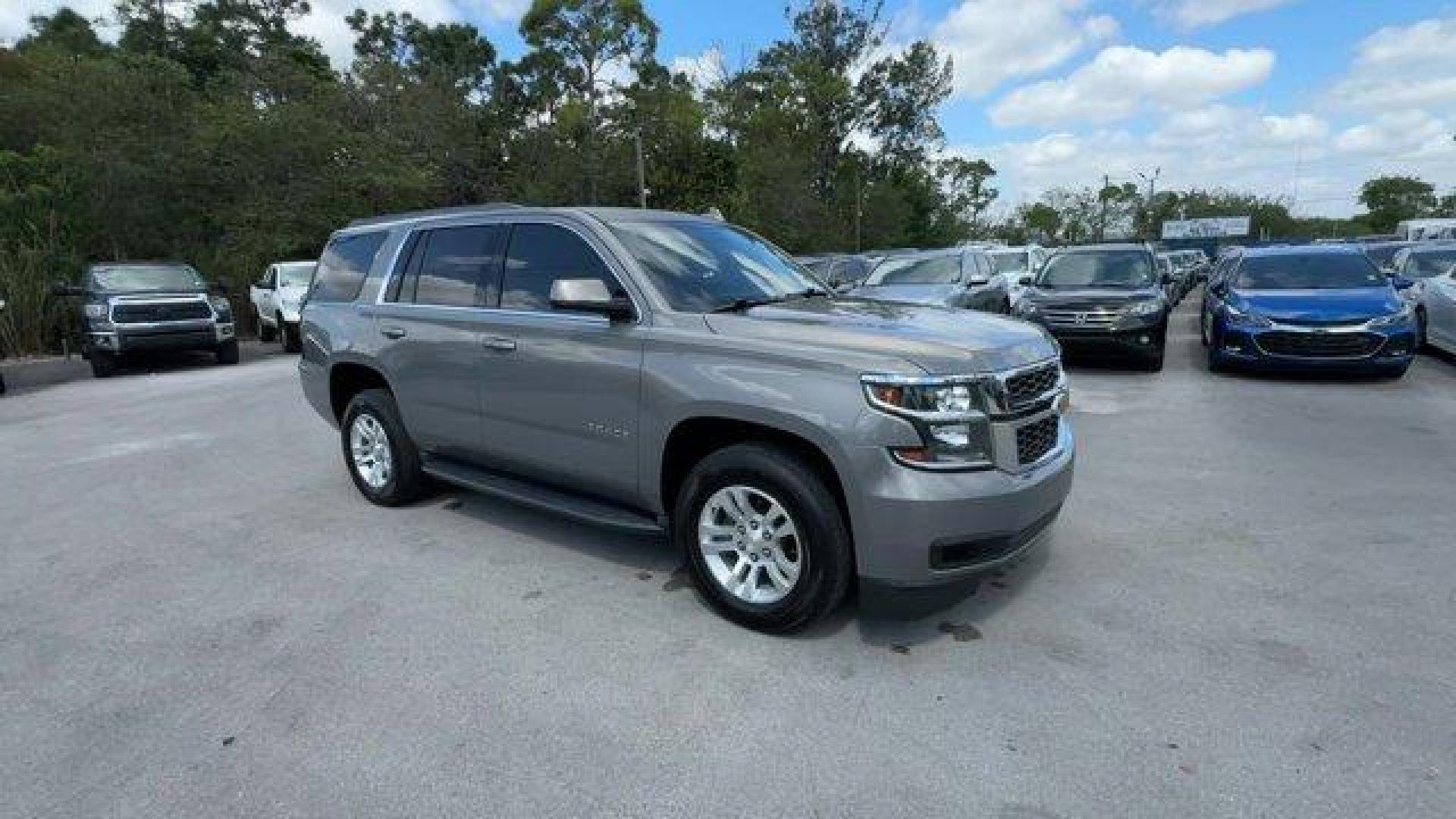 2018 Pepperdust Metallic /Jet Black Chevrolet Tahoe (1GNSCAKCXJR) with an 8 5.3L engine, Automatic transmission, located at 27610 S Dixie Hwy, Homestead, FL, 33032, (305) 749-2348, 25.510241, -80.438301 - KBB.com Best Family Cars. Scores 23 Highway MPG and 16 City MPG! This Chevrolet Tahoe boasts a Gas/Ethanol V8 5.3L/325 engine powering this Automatic transmission. WHEELS, 18 X 8.5 (45.7 CM X 21.6 CM) ALUMINUM WITH HIGH-POLISHED FINISH (STD), TRANSMISSION, 6-SPEED AUTOMATIC, ELECTRONICALLY CONTROLLE - Photo#6