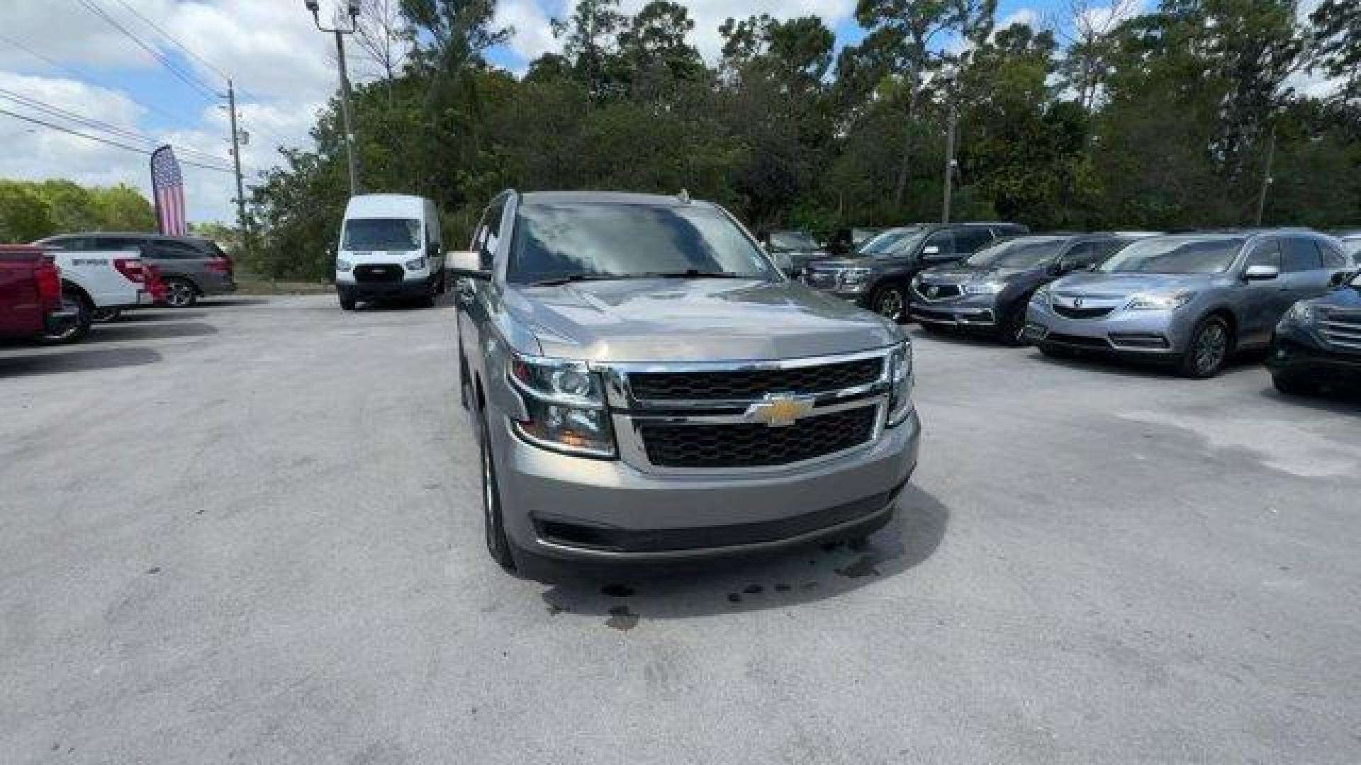 2018 Pepperdust Metallic /Jet Black Chevrolet Tahoe (1GNSCAKCXJR) with an 8 5.3L engine, Automatic transmission, located at 27610 S Dixie Hwy, Homestead, FL, 33032, (305) 749-2348, 25.510241, -80.438301 - KBB.com Best Family Cars. Scores 23 Highway MPG and 16 City MPG! This Chevrolet Tahoe boasts a Gas/Ethanol V8 5.3L/325 engine powering this Automatic transmission. WHEELS, 18 X 8.5 (45.7 CM X 21.6 CM) ALUMINUM WITH HIGH-POLISHED FINISH (STD), TRANSMISSION, 6-SPEED AUTOMATIC, ELECTRONICALLY CONTROLLE - Photo#7