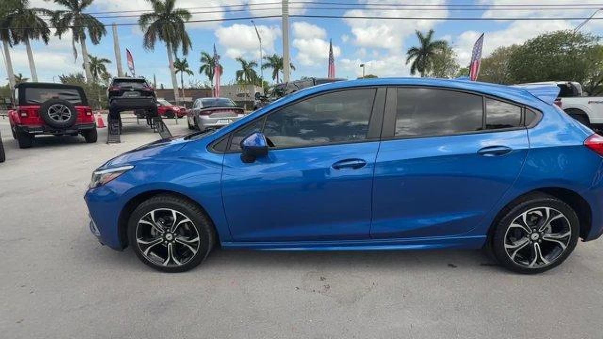 2019 Kinetic Blue Metallic /Jet Black Chevrolet Cruze (3G1BE6SM9KS) with an 4 1.4L engine, Automatic transmission, located at 27610 S Dixie Hwy, Homestead, FL, 33032, (305) 749-2348, 25.510241, -80.438301 - Delivers 38 Highway MPG and 28 City MPG! This Chevrolet Cruze delivers a Turbocharged Gas I4 1.4L/85 engine powering this Automatic transmission. TRANSMISSION, 6-SPEED AUTOMATIC (STD), SEATS, FRONT BUCKET WITH RECLINING SEATBACKS AND ADJUSTABLE HEAD RESTRAINTS (STD), LT PREFERRED EQUIPMENT GROUP inc - Photo#1