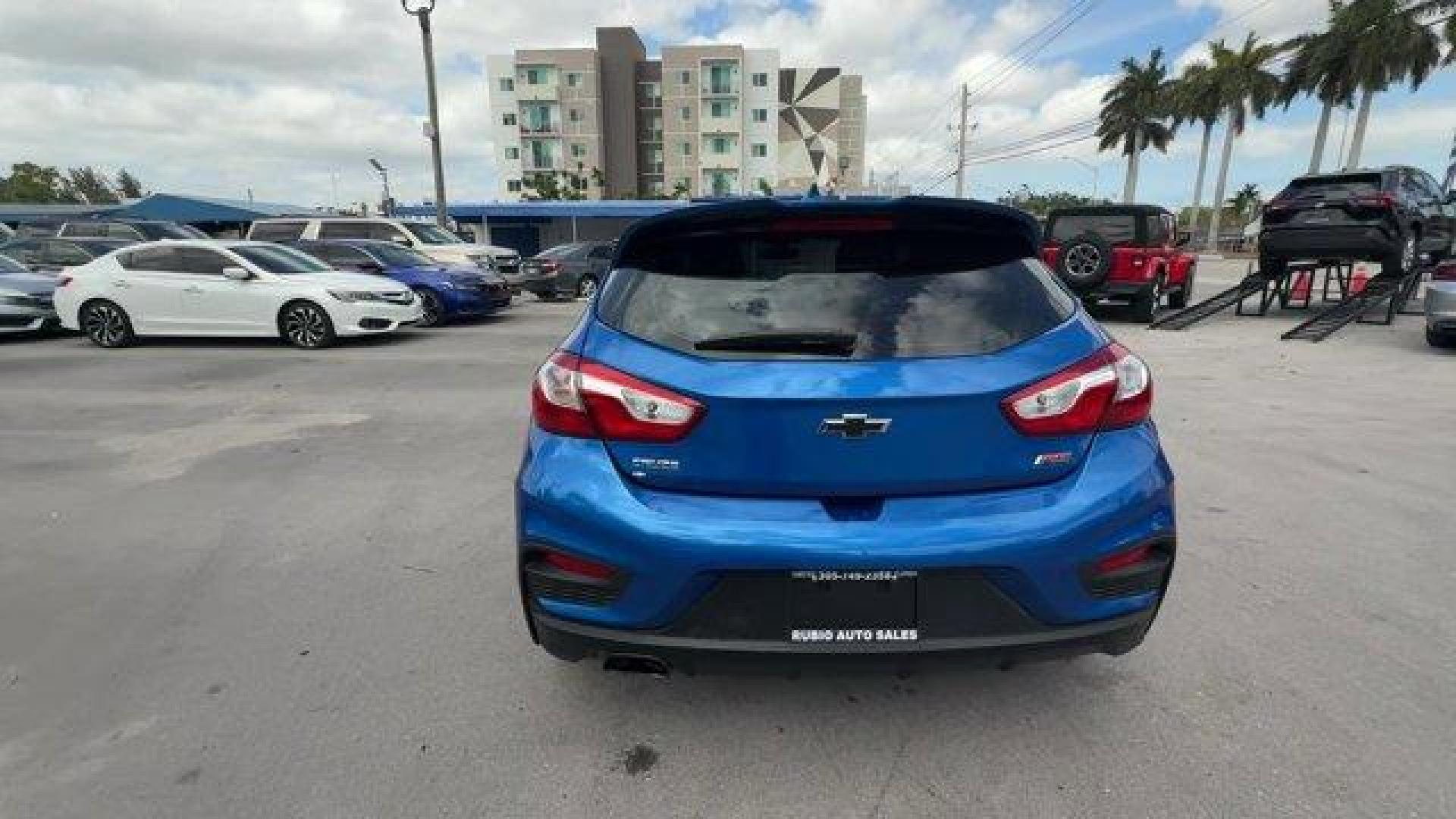 2019 Kinetic Blue Metallic /Jet Black Chevrolet Cruze (3G1BE6SM9KS) with an 4 1.4L engine, Automatic transmission, located at 27610 S Dixie Hwy, Homestead, FL, 33032, (305) 749-2348, 25.510241, -80.438301 - Delivers 38 Highway MPG and 28 City MPG! This Chevrolet Cruze delivers a Turbocharged Gas I4 1.4L/85 engine powering this Automatic transmission. TRANSMISSION, 6-SPEED AUTOMATIC (STD), SEATS, FRONT BUCKET WITH RECLINING SEATBACKS AND ADJUSTABLE HEAD RESTRAINTS (STD), LT PREFERRED EQUIPMENT GROUP inc - Photo#3
