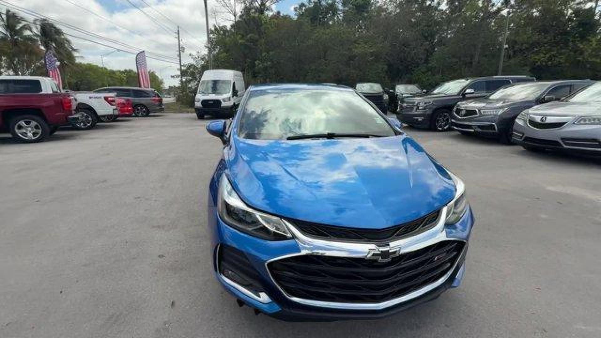 2019 Kinetic Blue Metallic /Jet Black Chevrolet Cruze (3G1BE6SM9KS) with an 4 1.4L engine, Automatic transmission, located at 27610 S Dixie Hwy, Homestead, FL, 33032, (305) 749-2348, 25.510241, -80.438301 - Delivers 38 Highway MPG and 28 City MPG! This Chevrolet Cruze delivers a Turbocharged Gas I4 1.4L/85 engine powering this Automatic transmission. TRANSMISSION, 6-SPEED AUTOMATIC (STD), SEATS, FRONT BUCKET WITH RECLINING SEATBACKS AND ADJUSTABLE HEAD RESTRAINTS (STD), LT PREFERRED EQUIPMENT GROUP inc - Photo#7
