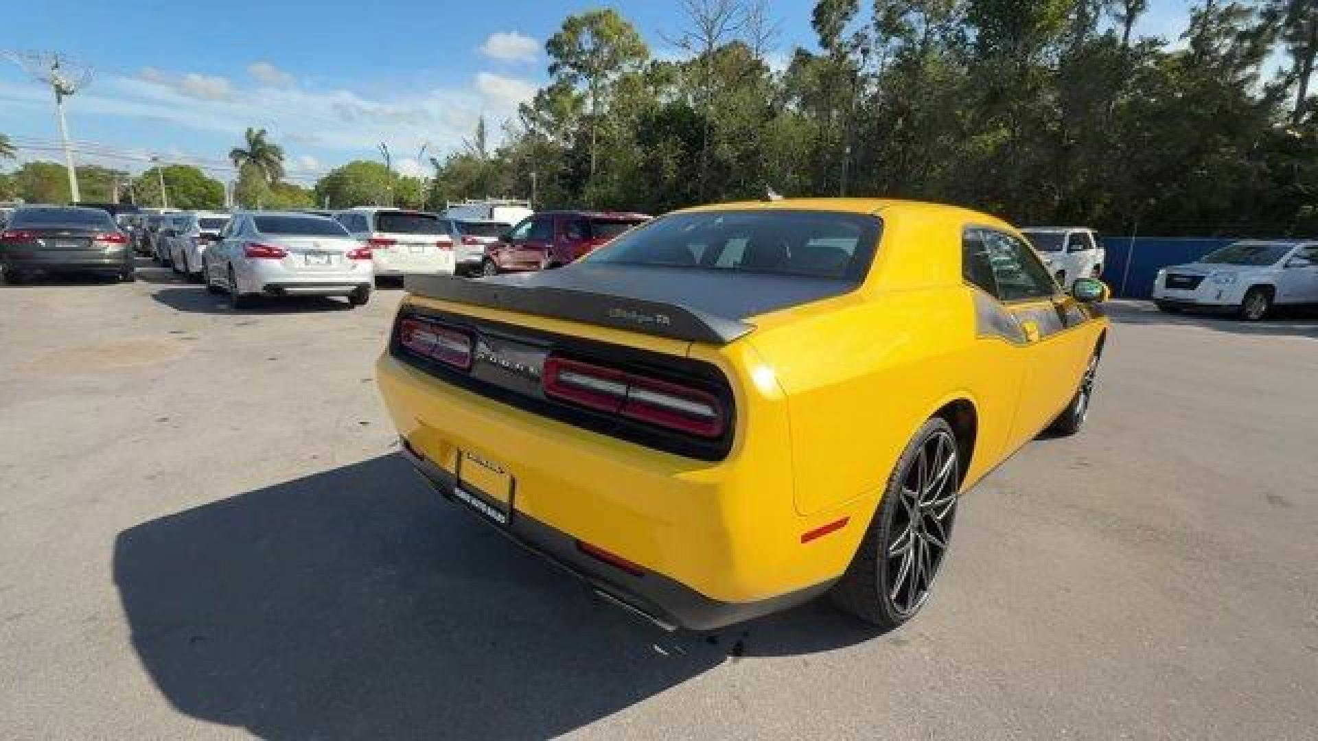 2017 Yellow Jacket Clearcoat /Black Dodge Challenger (2C3CDZBT8HH) with an 8 5.7 L engine, Automatic transmission, located at 27610 S Dixie Hwy, Homestead, FL, 33032, (305) 749-2348, 25.510241, -80.438301 - Delivers 25 Highway MPG and 16 City MPG! This Dodge Challenger delivers a Regular Unleaded V-8 5.7 L/345 engine powering this Automatic transmission. YELLOW JACKET CLEARCOAT, POWER SUNROOF, Window Grid Antenna.* This Dodge Challenger Features the Following Options *Voice Recorder, Variable Intermitt - Photo#4