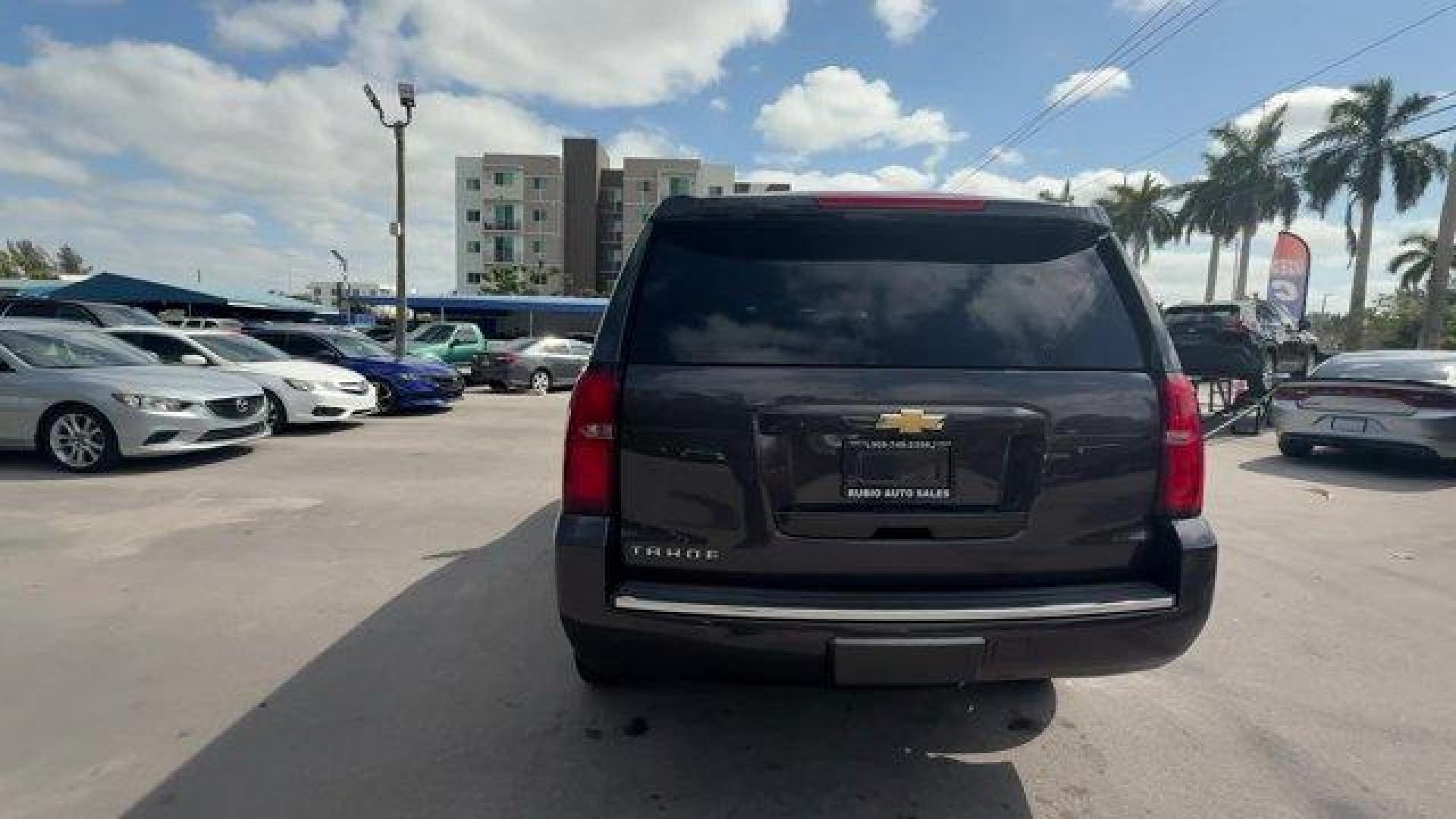2015 Tungsten Metallic /Jet Black Chevrolet Tahoe (1GNSCCKC3FR) with an 8 5.3L engine, Automatic transmission, located at 27610 S Dixie Hwy, Homestead, FL, 33032, (305) 749-2348, 25.510241, -80.438301 - KBB.com 15 Best Family Cars. Boasts 23 Highway MPG and 16 City MPG! This Chevrolet Tahoe boasts a Gas/Ethanol V8 5.3L/ engine powering this Automatic transmission. WHEELS, 22 (55.9 CM) PREMIUM PAINTED with chrome inserts, TUNGSTEN METALLIC, TRANSMISSION, 6-SPEED AUTOMATIC, ELECTRONICALLY CONTROLLED - Photo#3