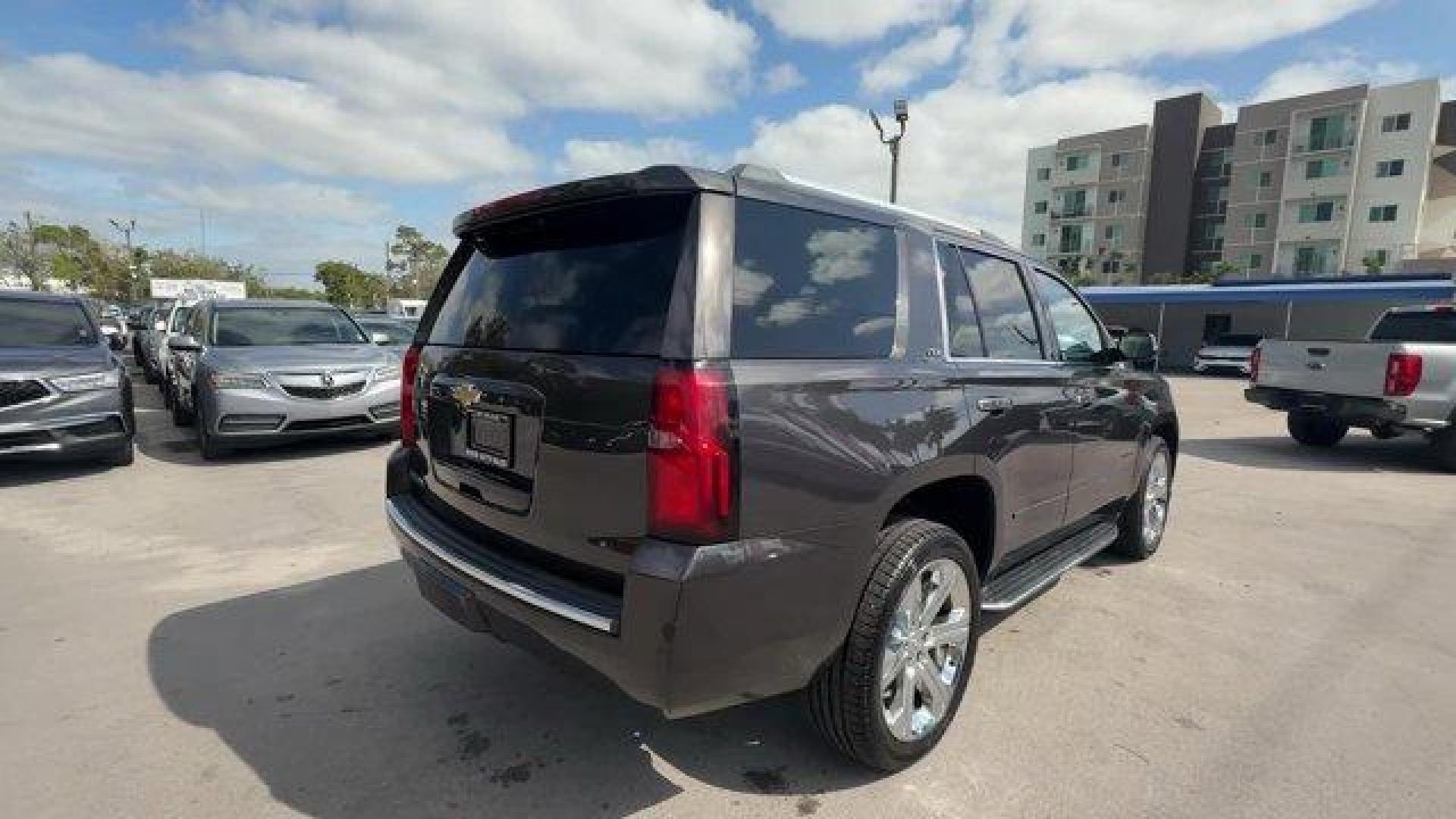 2015 Tungsten Metallic /Jet Black Chevrolet Tahoe (1GNSCCKC3FR) with an 8 5.3L engine, Automatic transmission, located at 27610 S Dixie Hwy, Homestead, FL, 33032, (305) 749-2348, 25.510241, -80.438301 - KBB.com 15 Best Family Cars. Boasts 23 Highway MPG and 16 City MPG! This Chevrolet Tahoe boasts a Gas/Ethanol V8 5.3L/ engine powering this Automatic transmission. WHEELS, 22 (55.9 CM) PREMIUM PAINTED with chrome inserts, TUNGSTEN METALLIC, TRANSMISSION, 6-SPEED AUTOMATIC, ELECTRONICALLY CONTROLLED - Photo#4