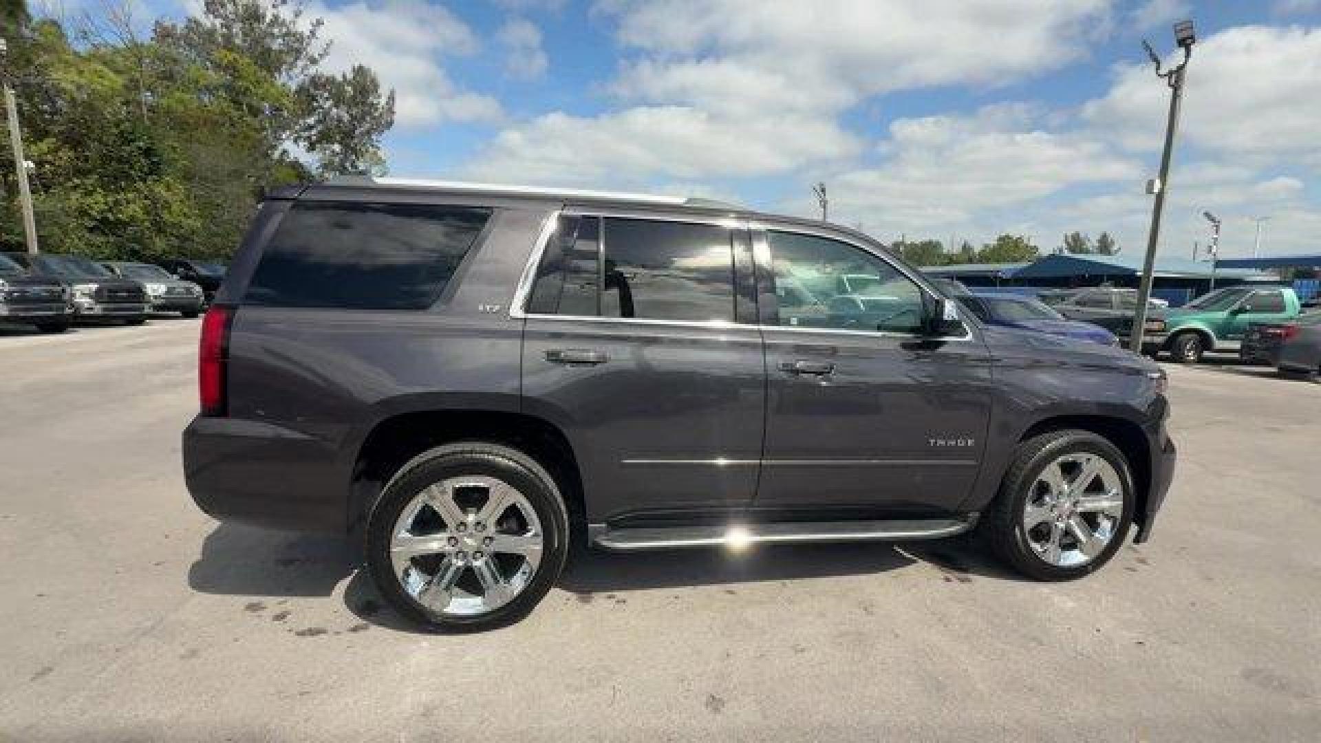 2015 Tungsten Metallic /Jet Black Chevrolet Tahoe (1GNSCCKC3FR) with an 8 5.3L engine, Automatic transmission, located at 27610 S Dixie Hwy, Homestead, FL, 33032, (305) 749-2348, 25.510241, -80.438301 - KBB.com 15 Best Family Cars. Boasts 23 Highway MPG and 16 City MPG! This Chevrolet Tahoe boasts a Gas/Ethanol V8 5.3L/ engine powering this Automatic transmission. WHEELS, 22 (55.9 CM) PREMIUM PAINTED with chrome inserts, TUNGSTEN METALLIC, TRANSMISSION, 6-SPEED AUTOMATIC, ELECTRONICALLY CONTROLLED - Photo#5