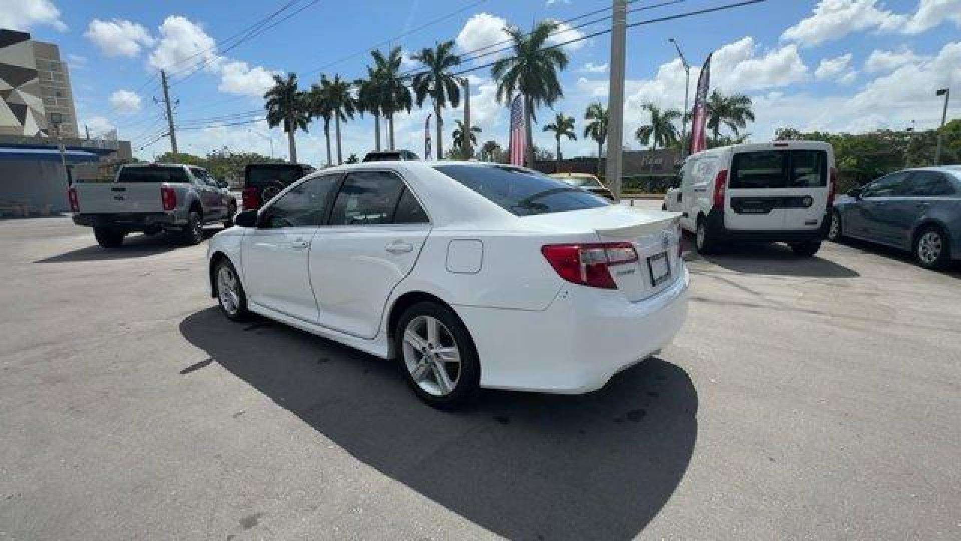 2014 White Toyota Camry (4T1BF1FK0EU) with an 4 2.5 L engine, Automatic transmission, located at 27610 S Dixie Hwy, Homestead, FL, 33032, (305) 749-2348, 25.510241, -80.438301 - KBB.com 10 Best Hybrid Cars Under $30,000. Only 120,921 Miles! Boasts 35 Highway MPG and 25 City MPG! This Toyota Camry delivers a Regular Unleaded I-4 2.5 L/152 engine powering this Automatic transmission. Window Grid Antenna, Valet Function, Trunk Rear Cargo Access.*This Toyota Camry Comes Equippe - Photo#2
