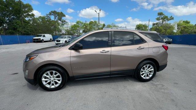 2018 Sandy Ridge Metallic /Medium Ash Gray Chevrolet Equinox (2GNAXHEV3J6) with an 4 1.5L engine, Automatic transmission, located at 27610 S Dixie Hwy, Homestead, FL, 33032, (305) 749-2348, 25.510241, -80.438301 - KBB.com Best Family Cars. Delivers 32 Highway MPG and 26 City MPG! This Chevrolet Equinox delivers a Turbocharged Gas I4 1.5L/ engine powering this Automatic transmission. WHEELS, 17 (43.2 CM) ALUMINUM (STD), TRANSMISSION, 6-SPEED AUTOMATIC, ELECTRONICALLY-CONTROLLED WITH OVERDRIVE includes Driver S - Photo#0