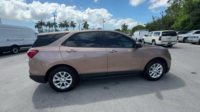 2018 Sandy Ridge Metallic /Medium Ash Gray Chevrolet Equinox (2GNAXHEV3J6) with an 4 1.5L engine, Automatic transmission, located at 27610 S Dixie Hwy, Homestead, FL, 33032, (305) 749-2348, 25.510241, -80.438301 - KBB.com Best Family Cars. Delivers 32 Highway MPG and 26 City MPG! This Chevrolet Equinox delivers a Turbocharged Gas I4 1.5L/ engine powering this Automatic transmission. WHEELS, 17 (43.2 CM) ALUMINUM (STD), TRANSMISSION, 6-SPEED AUTOMATIC, ELECTRONICALLY-CONTROLLED WITH OVERDRIVE includes Driver S - Photo#5