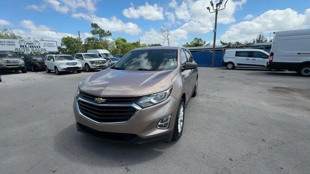 2018 Sandy Ridge Metallic /Medium Ash Gray Chevrolet Equinox (2GNAXHEV3J6) with an 4 1.5L engine, Automatic transmission, located at 27610 S Dixie Hwy, Homestead, FL, 33032, (305) 749-2348, 25.510241, -80.438301 - KBB.com Best Family Cars. Delivers 32 Highway MPG and 26 City MPG! This Chevrolet Equinox delivers a Turbocharged Gas I4 1.5L/ engine powering this Automatic transmission. WHEELS, 17 (43.2 CM) ALUMINUM (STD), TRANSMISSION, 6-SPEED AUTOMATIC, ELECTRONICALLY-CONTROLLED WITH OVERDRIVE includes Driver S - Photo#8