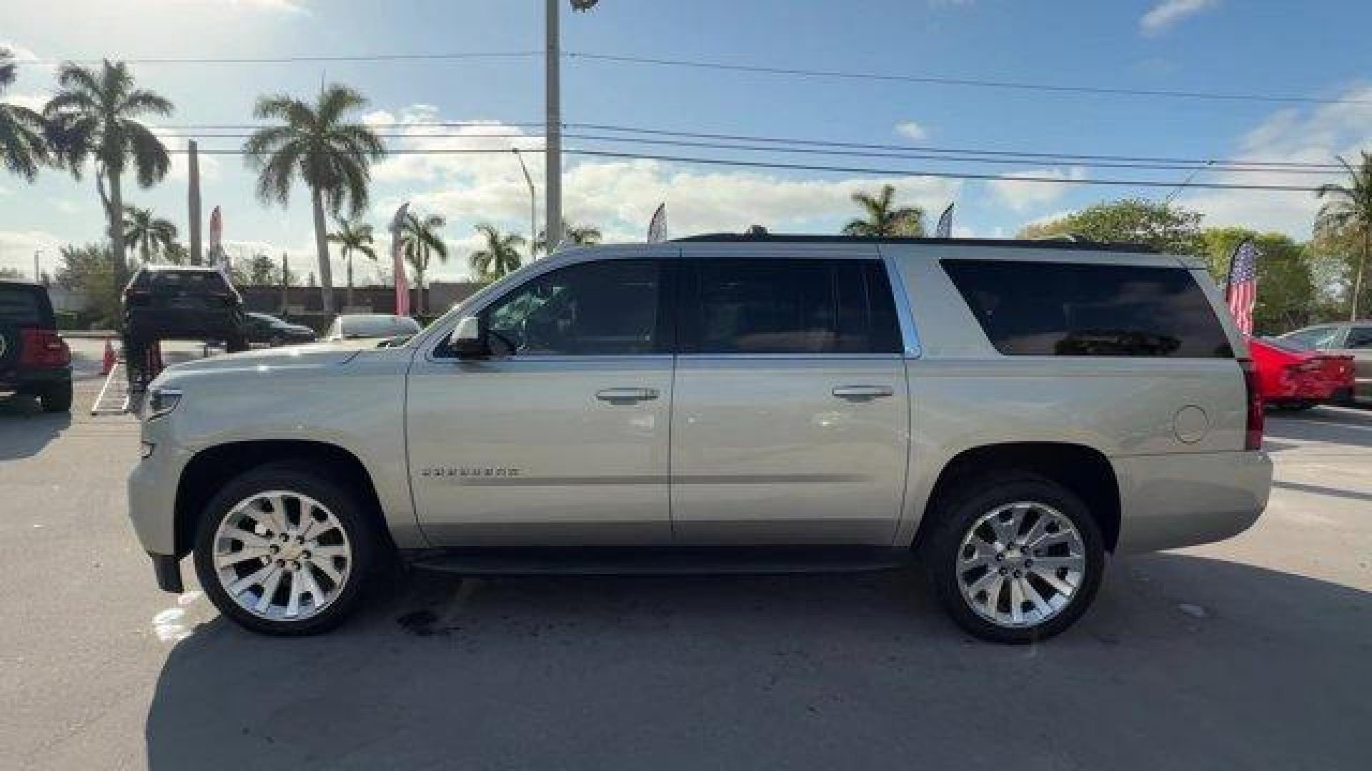 2015 Champagne Silver Metallic /Cocoa/Dune Chevrolet Suburban (1GNSCJKC9FR) with an 8 5.3L engine, Automatic transmission, located at 27610 S Dixie Hwy, Homestead, FL, 33032, (305) 749-2348, 25.510241, -80.438301 - KBB.com Best Resale Value Awards. Boasts 23 Highway MPG and 16 City MPG! This Chevrolet Suburban boasts a Gas/Ethanol V8 5.3L/ engine powering this Automatic transmission. WHEELS, 22 X 9 STEEL, INTERIM, TRANSMISSION, 6-SPEED AUTOMATIC, ELECTRONICALLY CONTROLLED with overdrive and tow/haul mode (STD) - Photo#1