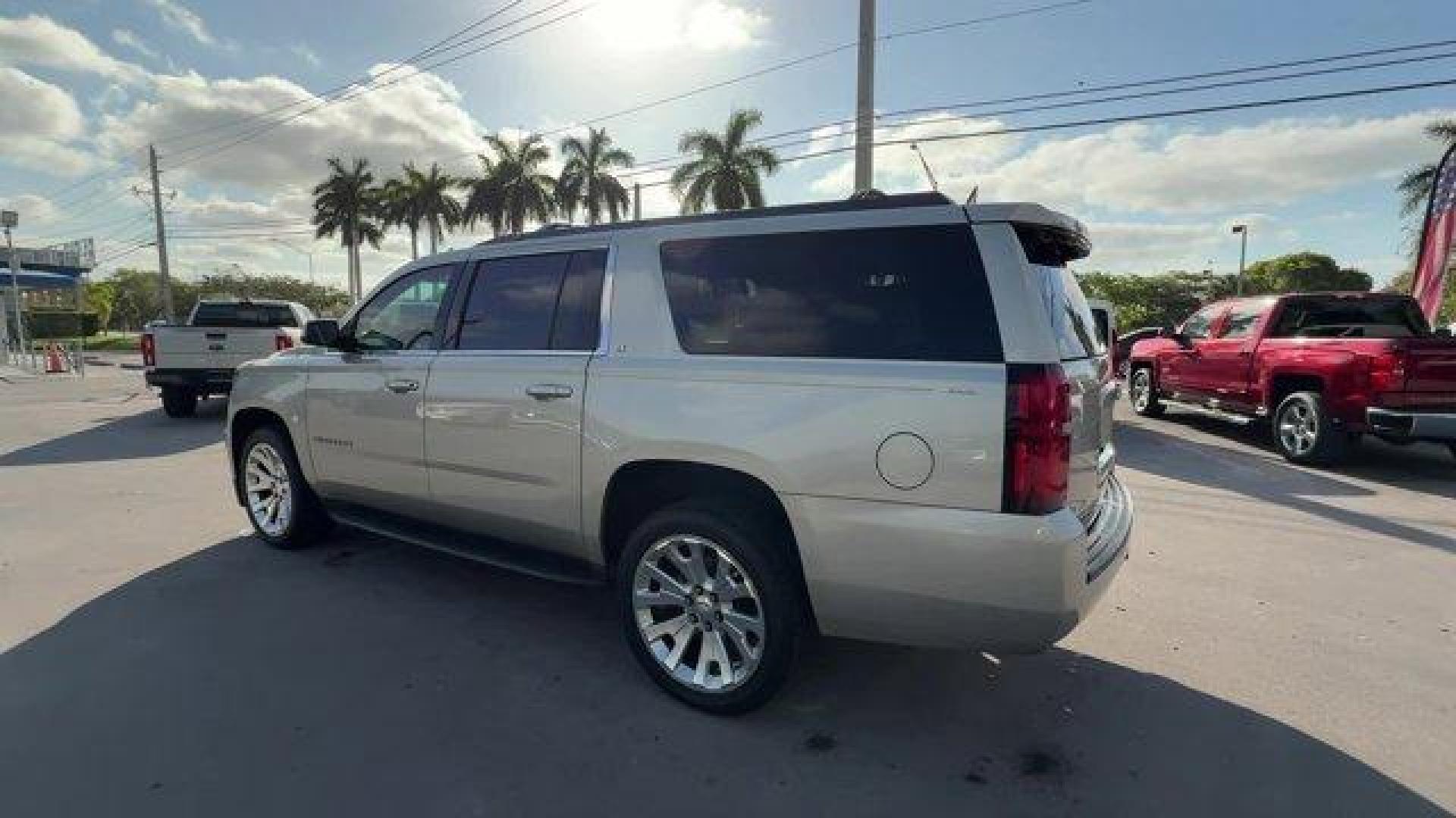 2015 Champagne Silver Metallic /Cocoa/Dune Chevrolet Suburban (1GNSCJKC9FR) with an 8 5.3L engine, Automatic transmission, located at 27610 S Dixie Hwy, Homestead, FL, 33032, (305) 749-2348, 25.510241, -80.438301 - KBB.com Best Resale Value Awards. Boasts 23 Highway MPG and 16 City MPG! This Chevrolet Suburban boasts a Gas/Ethanol V8 5.3L/ engine powering this Automatic transmission. WHEELS, 22 X 9 STEEL, INTERIM, TRANSMISSION, 6-SPEED AUTOMATIC, ELECTRONICALLY CONTROLLED with overdrive and tow/haul mode (STD) - Photo#2