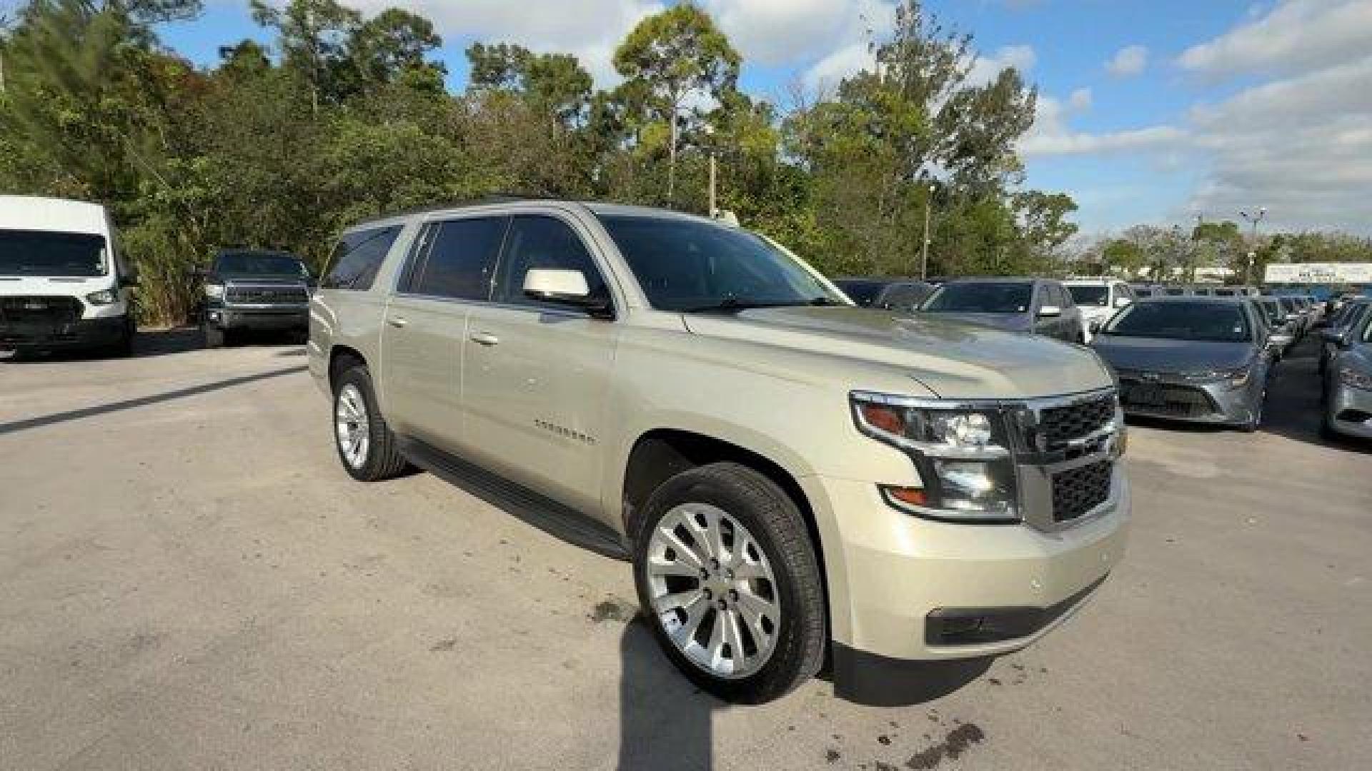2015 Champagne Silver Metallic /Cocoa/Dune Chevrolet Suburban (1GNSCJKC9FR) with an 8 5.3L engine, Automatic transmission, located at 27610 S Dixie Hwy, Homestead, FL, 33032, (305) 749-2348, 25.510241, -80.438301 - KBB.com Best Resale Value Awards. Boasts 23 Highway MPG and 16 City MPG! This Chevrolet Suburban boasts a Gas/Ethanol V8 5.3L/ engine powering this Automatic transmission. WHEELS, 22 X 9 STEEL, INTERIM, TRANSMISSION, 6-SPEED AUTOMATIC, ELECTRONICALLY CONTROLLED with overdrive and tow/haul mode (STD) - Photo#6