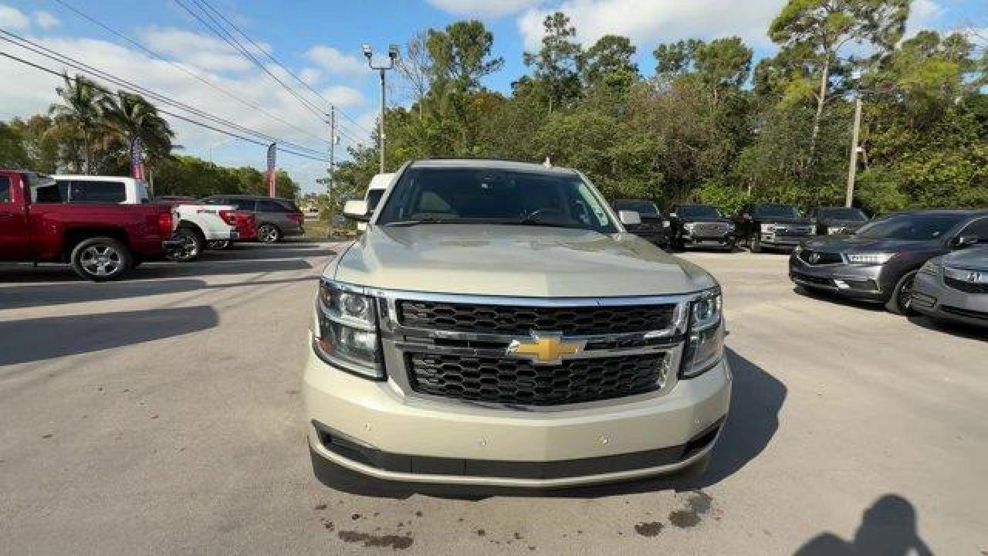 2015 Champagne Silver Metallic /Cocoa/Dune Chevrolet Suburban (1GNSCJKC9FR) with an 8 5.3L engine, Automatic transmission, located at 27610 S Dixie Hwy, Homestead, FL, 33032, (305) 749-2348, 25.510241, -80.438301 - KBB.com Best Resale Value Awards. Boasts 23 Highway MPG and 16 City MPG! This Chevrolet Suburban boasts a Gas/Ethanol V8 5.3L/ engine powering this Automatic transmission. WHEELS, 22 X 9 STEEL, INTERIM, TRANSMISSION, 6-SPEED AUTOMATIC, ELECTRONICALLY CONTROLLED with overdrive and tow/haul mode (STD) - Photo#7