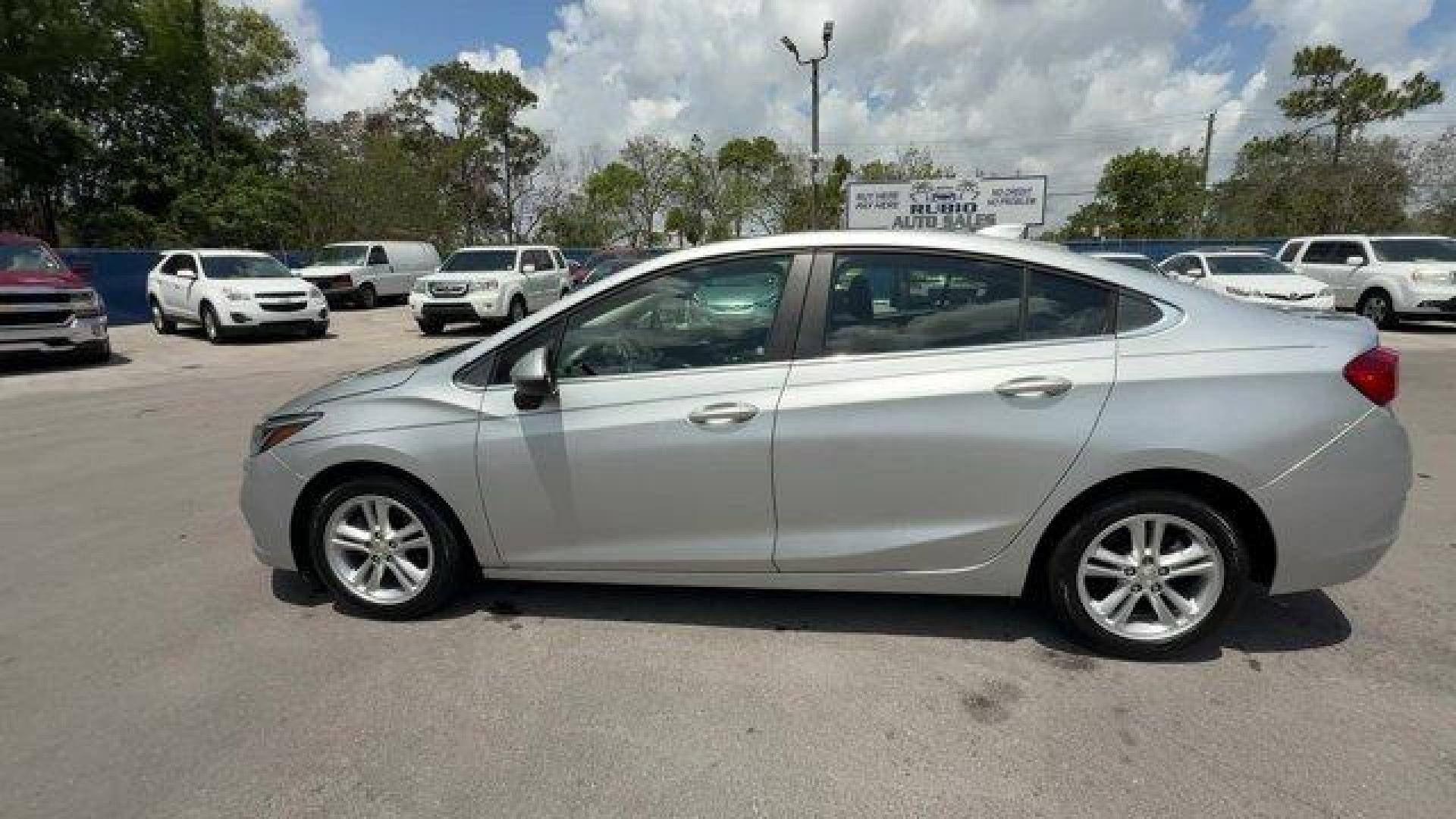 2018 Silver Ice Metallic /Jet Black Chevrolet Cruze (1G1BE5SMXJ7) with an 4 1.4L engine, Automatic transmission, located at 27610 S Dixie Hwy, Homestead, FL, 33032, (305) 749-2348, 25.510241, -80.438301 - KBB.com 10 Most Awarded Brands. Scores 40 Highway MPG and 29 City MPG! This Chevrolet Cruze delivers a Turbocharged Gas I4 1.4L/ engine powering this Automatic transmission. WHEELS, 16 (40.6 CM) ALUMINUM (STD), TRANSMISSION, 6-SPEED AUTOMATIC (STD), TIRES, 205/55R16 ALL-SEASON, BLACKWALL.* This Chev - Photo#1