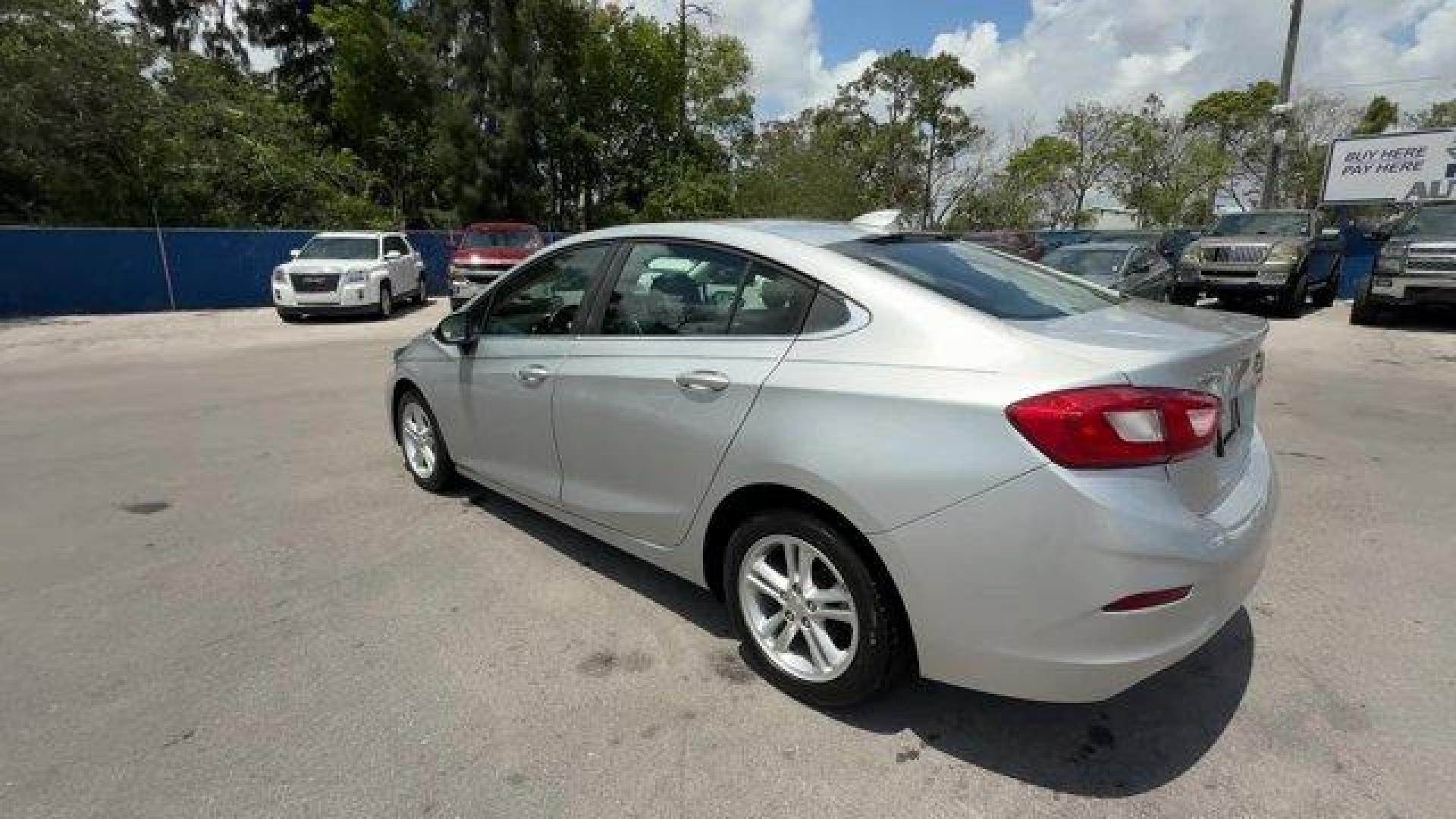 2018 Silver Ice Metallic /Jet Black Chevrolet Cruze (1G1BE5SMXJ7) with an 4 1.4L engine, Automatic transmission, located at 27610 S Dixie Hwy, Homestead, FL, 33032, (305) 749-2348, 25.510241, -80.438301 - KBB.com 10 Most Awarded Brands. Scores 40 Highway MPG and 29 City MPG! This Chevrolet Cruze delivers a Turbocharged Gas I4 1.4L/ engine powering this Automatic transmission. WHEELS, 16 (40.6 CM) ALUMINUM (STD), TRANSMISSION, 6-SPEED AUTOMATIC (STD), TIRES, 205/55R16 ALL-SEASON, BLACKWALL.* This Chev - Photo#2