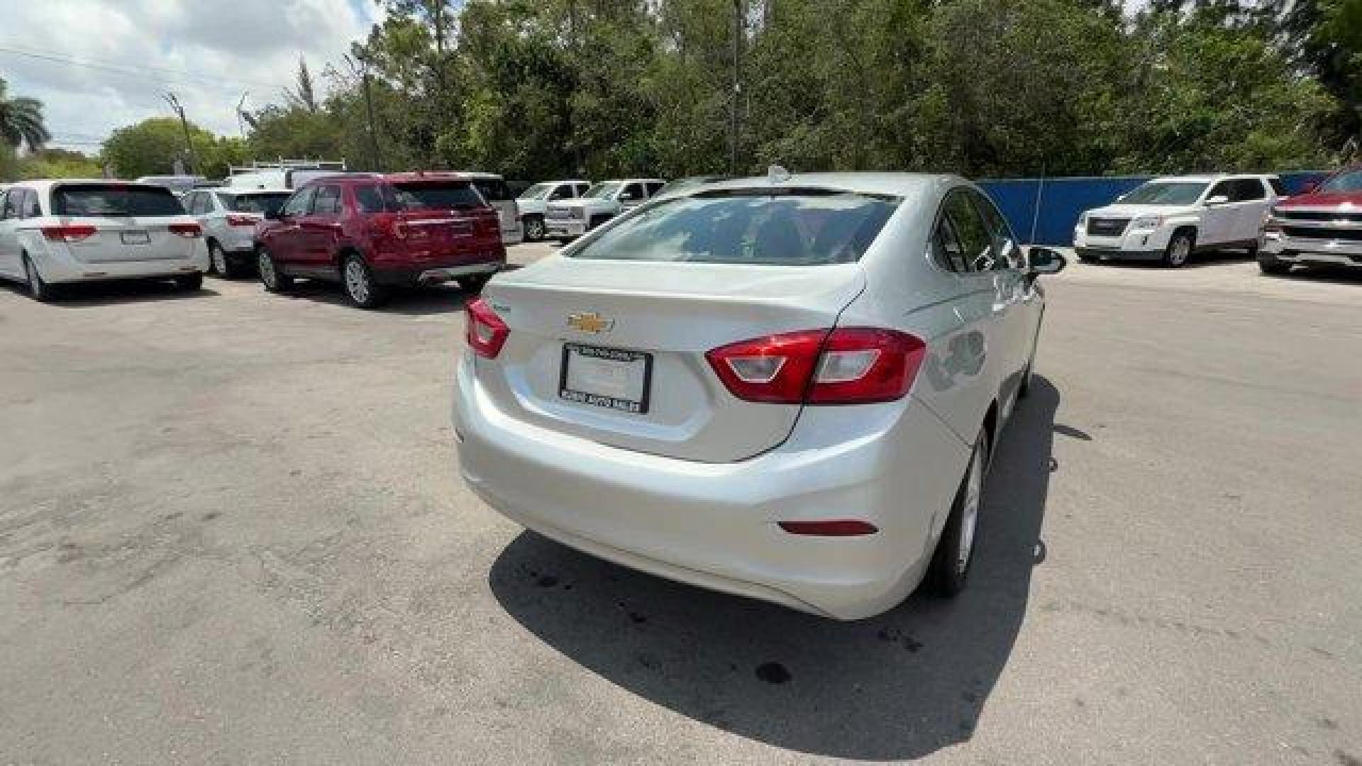 2018 Silver Ice Metallic /Jet Black Chevrolet Cruze (1G1BE5SMXJ7) with an 4 1.4L engine, Automatic transmission, located at 27610 S Dixie Hwy, Homestead, FL, 33032, (305) 749-2348, 25.510241, -80.438301 - KBB.com 10 Most Awarded Brands. Scores 40 Highway MPG and 29 City MPG! This Chevrolet Cruze delivers a Turbocharged Gas I4 1.4L/ engine powering this Automatic transmission. WHEELS, 16 (40.6 CM) ALUMINUM (STD), TRANSMISSION, 6-SPEED AUTOMATIC (STD), TIRES, 205/55R16 ALL-SEASON, BLACKWALL.* This Chev - Photo#4