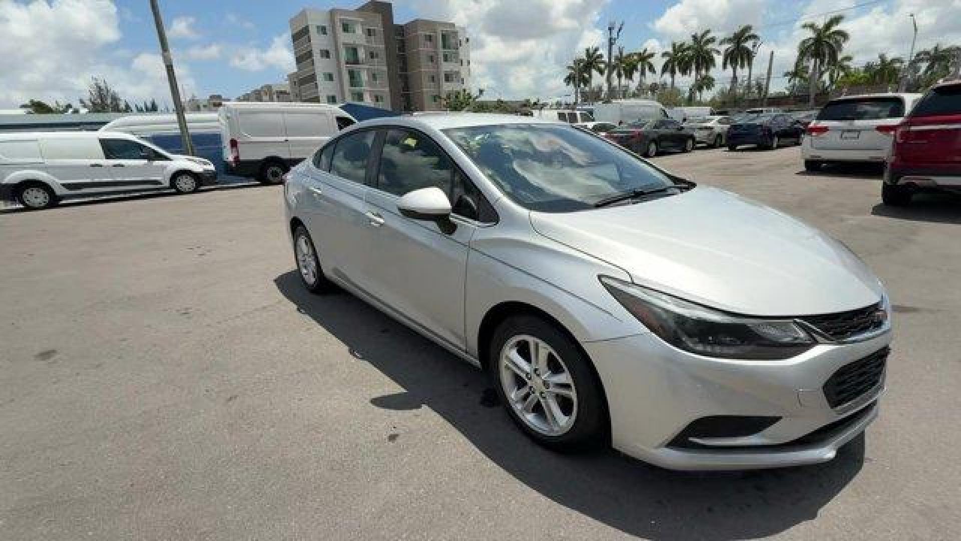 2018 Silver Ice Metallic /Jet Black Chevrolet Cruze (1G1BE5SMXJ7) with an 4 1.4L engine, Automatic transmission, located at 27610 S Dixie Hwy, Homestead, FL, 33032, (305) 749-2348, 25.510241, -80.438301 - KBB.com 10 Most Awarded Brands. Scores 40 Highway MPG and 29 City MPG! This Chevrolet Cruze delivers a Turbocharged Gas I4 1.4L/ engine powering this Automatic transmission. WHEELS, 16 (40.6 CM) ALUMINUM (STD), TRANSMISSION, 6-SPEED AUTOMATIC (STD), TIRES, 205/55R16 ALL-SEASON, BLACKWALL.* This Chev - Photo#6