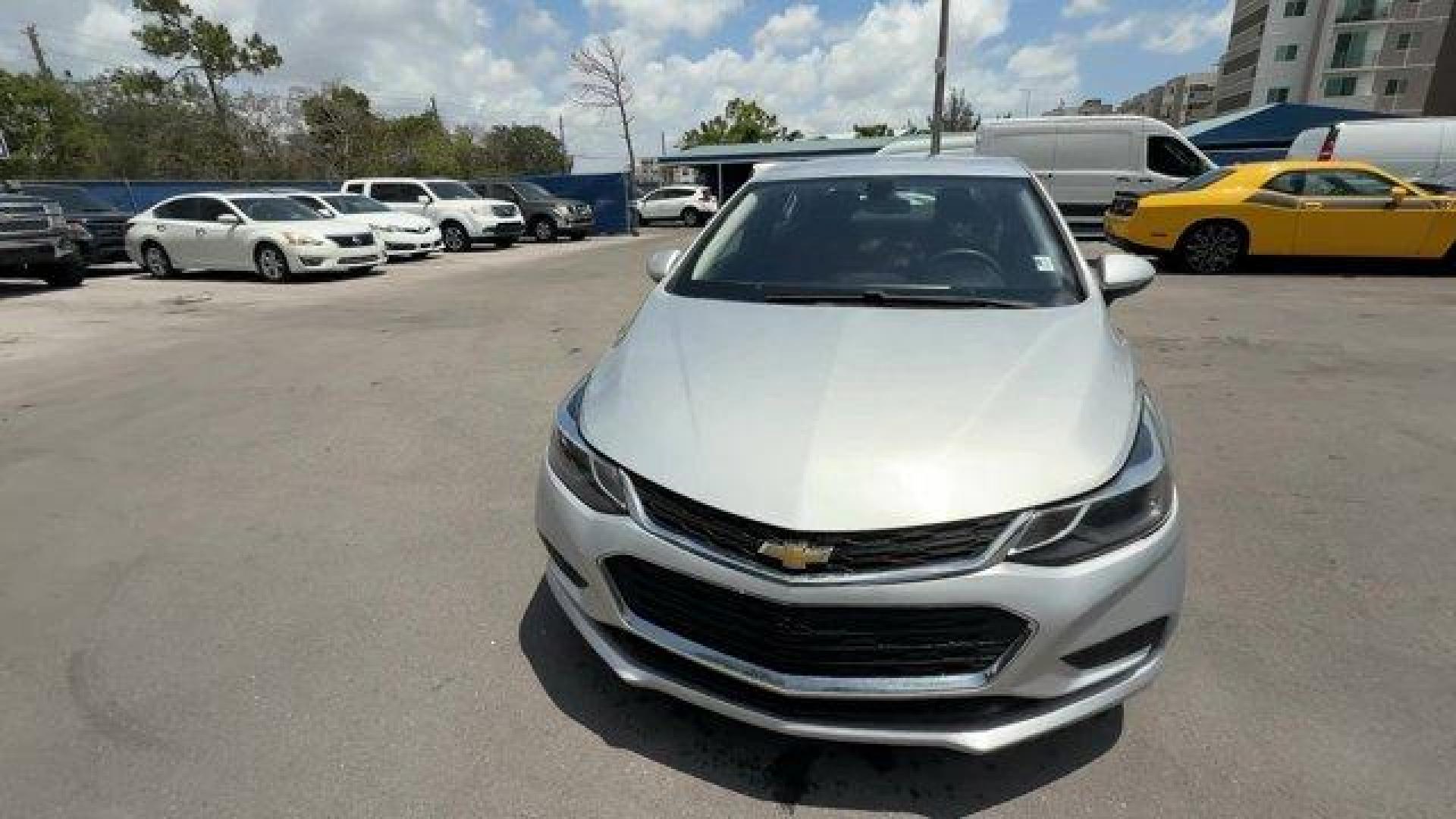 2018 Silver Ice Metallic /Jet Black Chevrolet Cruze (1G1BE5SMXJ7) with an 4 1.4L engine, Automatic transmission, located at 27610 S Dixie Hwy, Homestead, FL, 33032, (305) 749-2348, 25.510241, -80.438301 - KBB.com 10 Most Awarded Brands. Scores 40 Highway MPG and 29 City MPG! This Chevrolet Cruze delivers a Turbocharged Gas I4 1.4L/ engine powering this Automatic transmission. WHEELS, 16 (40.6 CM) ALUMINUM (STD), TRANSMISSION, 6-SPEED AUTOMATIC (STD), TIRES, 205/55R16 ALL-SEASON, BLACKWALL.* This Chev - Photo#7