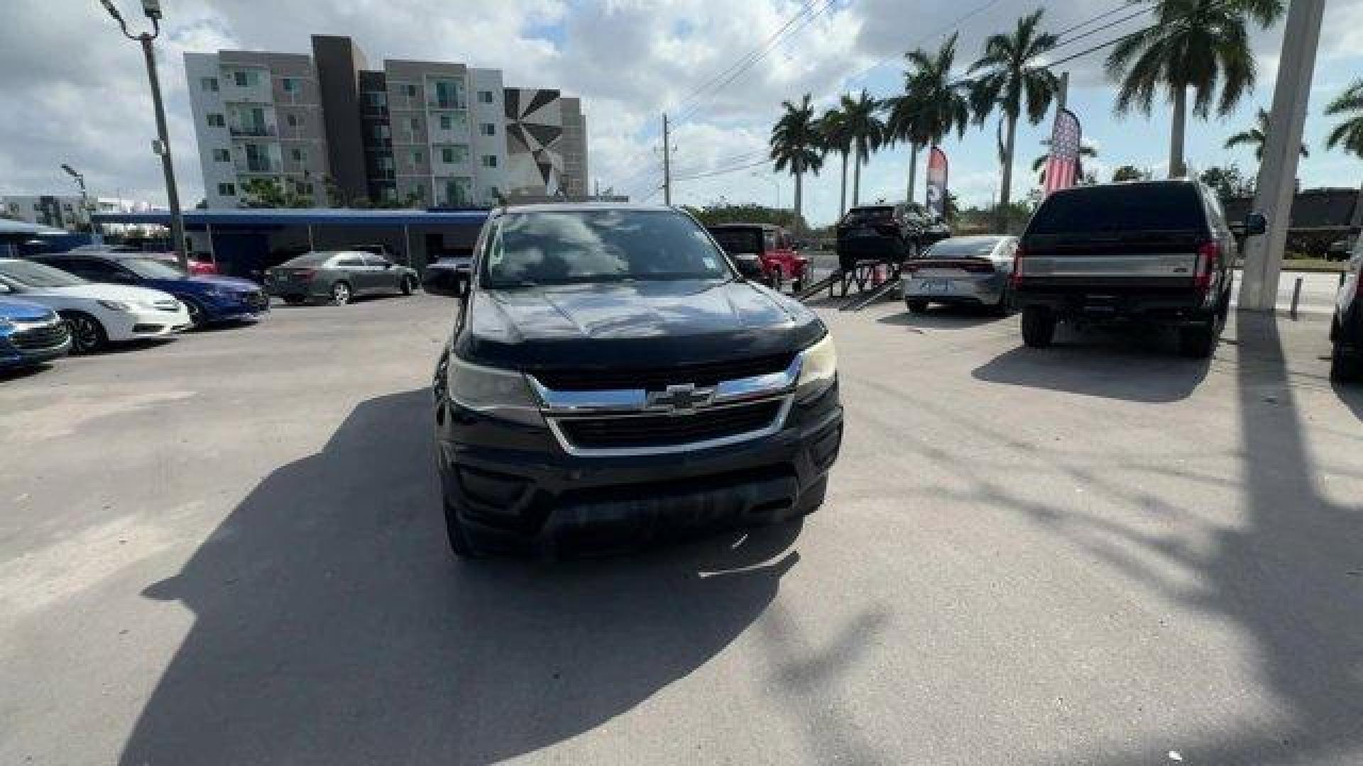 2016 Black /Jet Black/Dark Ash Chevrolet Colorado (1GCGSBE32G1) with an 6 3.6L engine, Automatic transmission, located at 27610 S Dixie Hwy, Homestead, FL, 33032, (305) 749-2348, 25.510241, -80.438301 - KBB.com Best Resale Value Awards. Boasts 26 Highway MPG and 18 City MPG! This Chevrolet Colorado boasts a Gas V6 3.6L/217 engine powering this Automatic transmission. WT CONVENIENCE PACKAGE includes (ATG) Remote Keyless Entry, (UTJ) theft-deterrent system, (K34) electronic cruise control and (PPA) E - Photo#6
